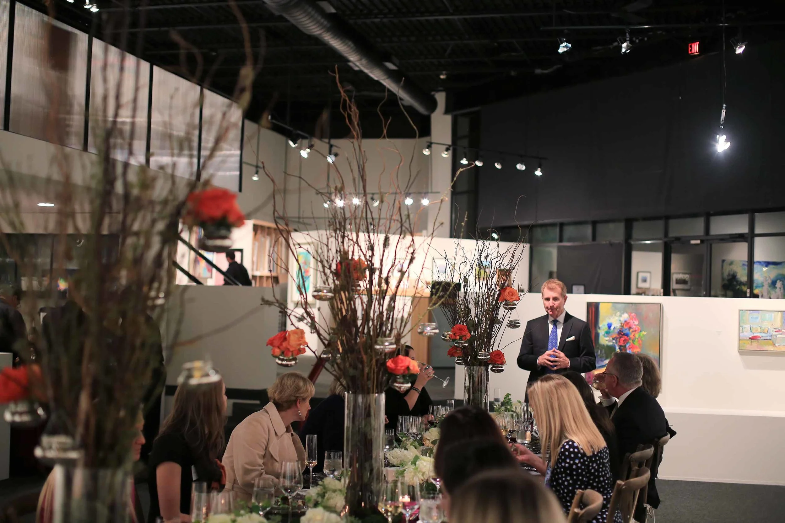 Mr. Elder thanking guests and discussing his mission with the gallery.