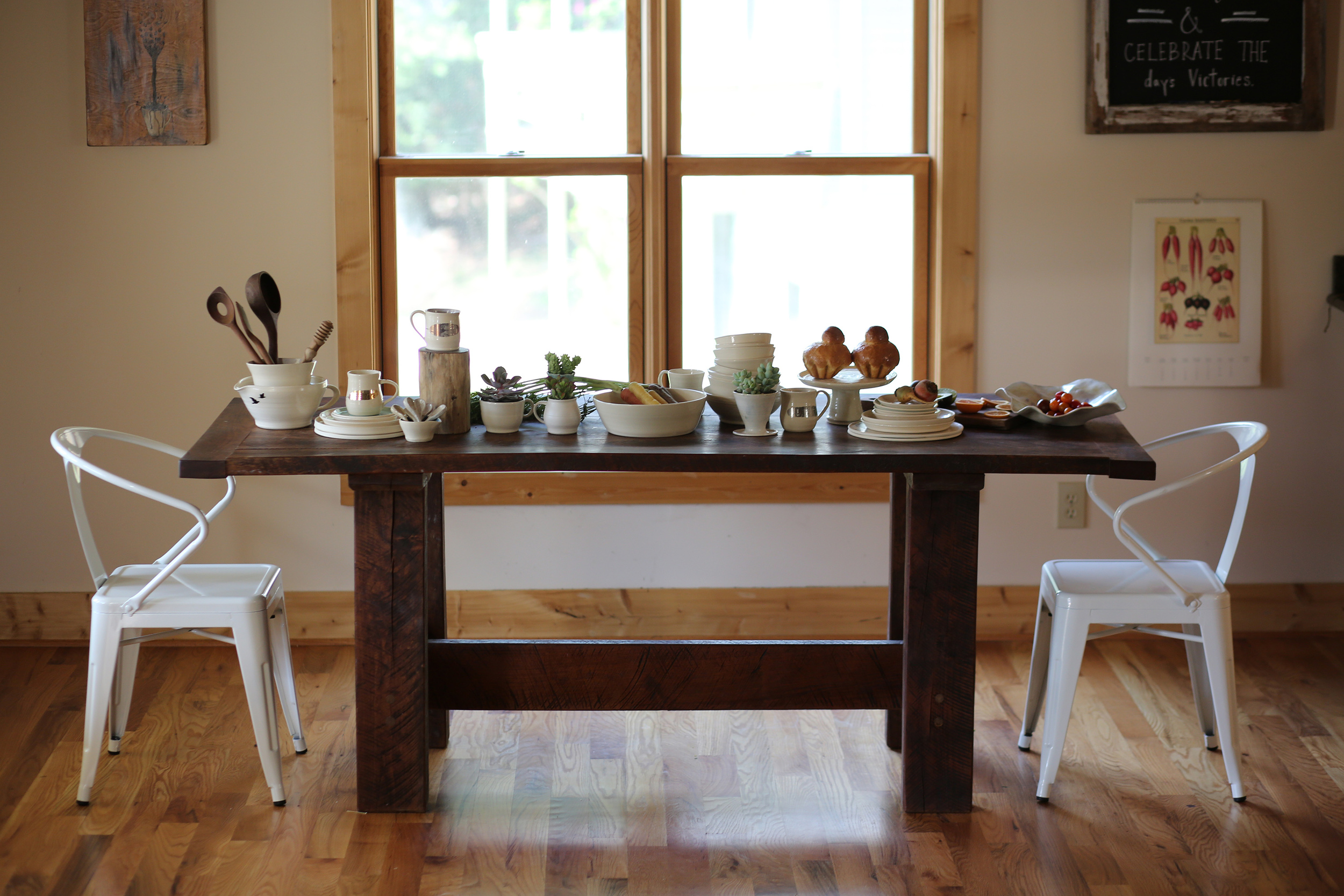 Farm table was crafted by Melina's husband and fellow artist at Overflow Studios.