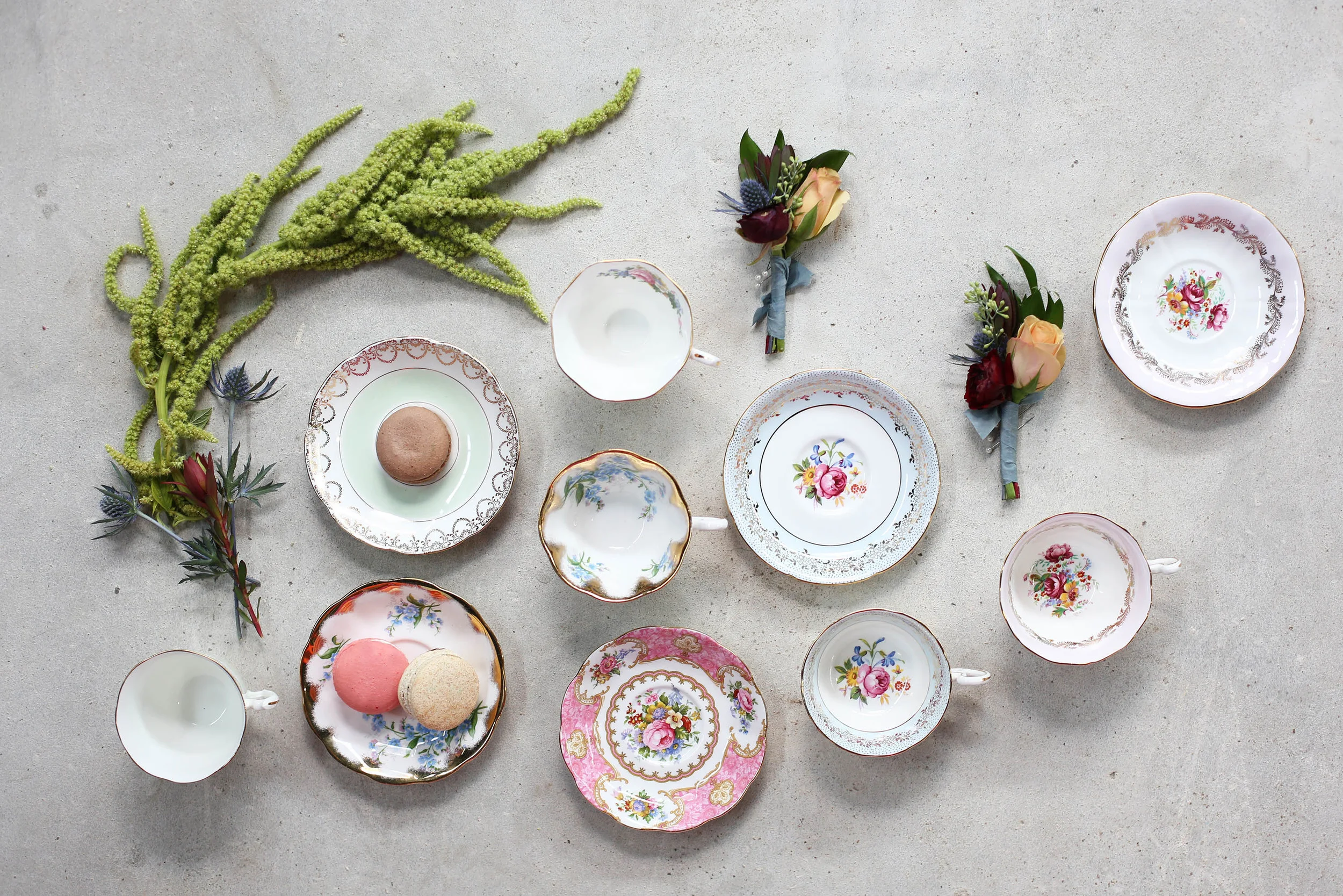 again, a "floor composition" with china and flowers. Love this shot and these boutonnières! 
