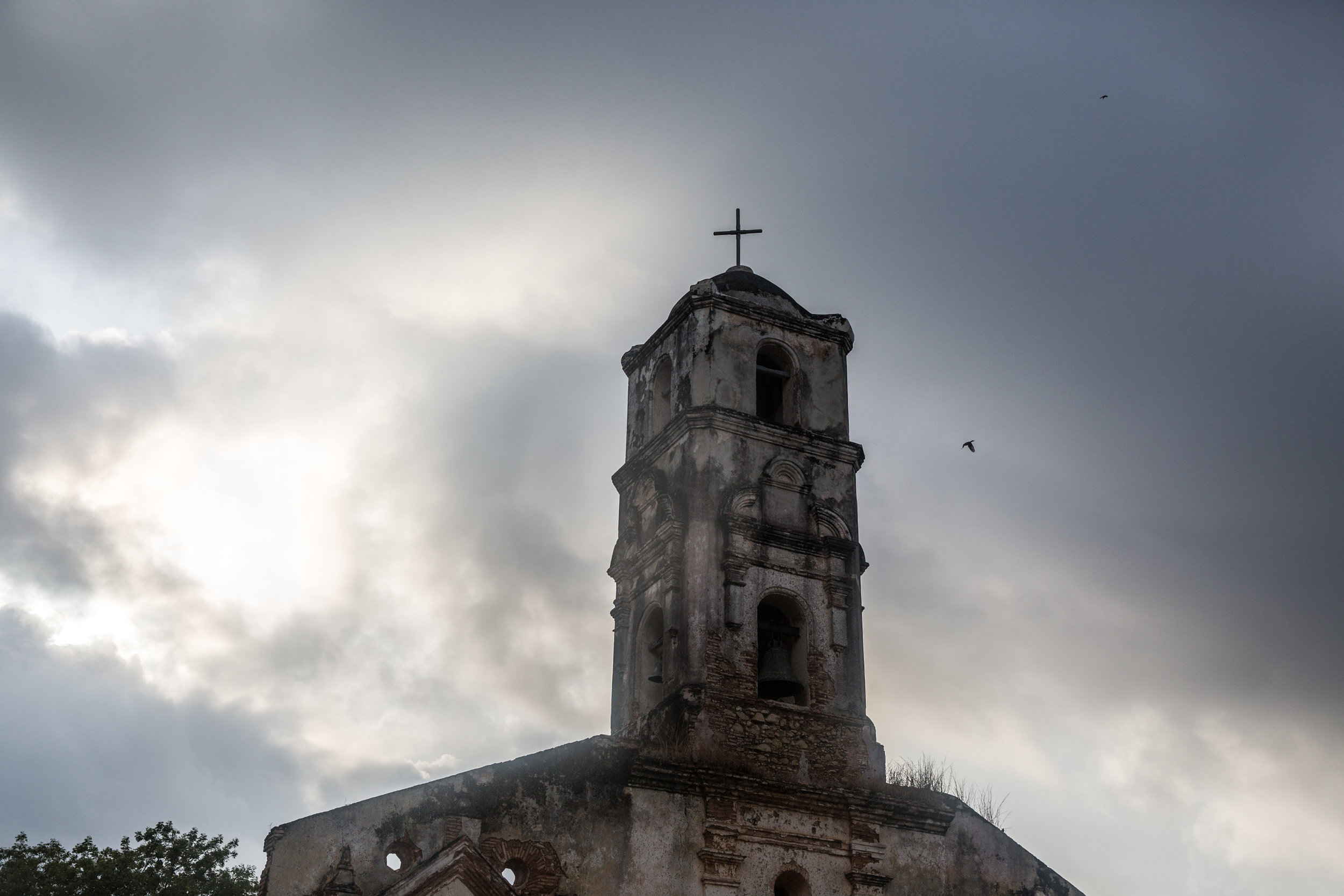 Rain rolling into the center of Trinidad over one of the many churches in the city on our last evening in Trinidad.