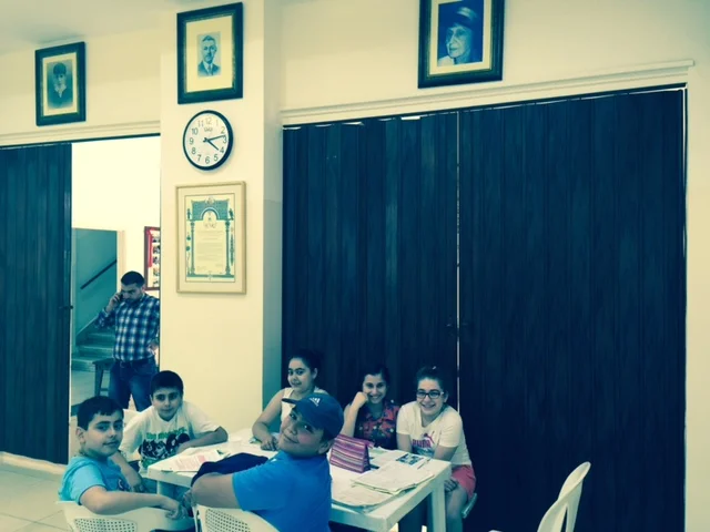 After school remedial classes to Syrian refugees in Bourj Hammoud / Karageuzian foundation family portraits on top