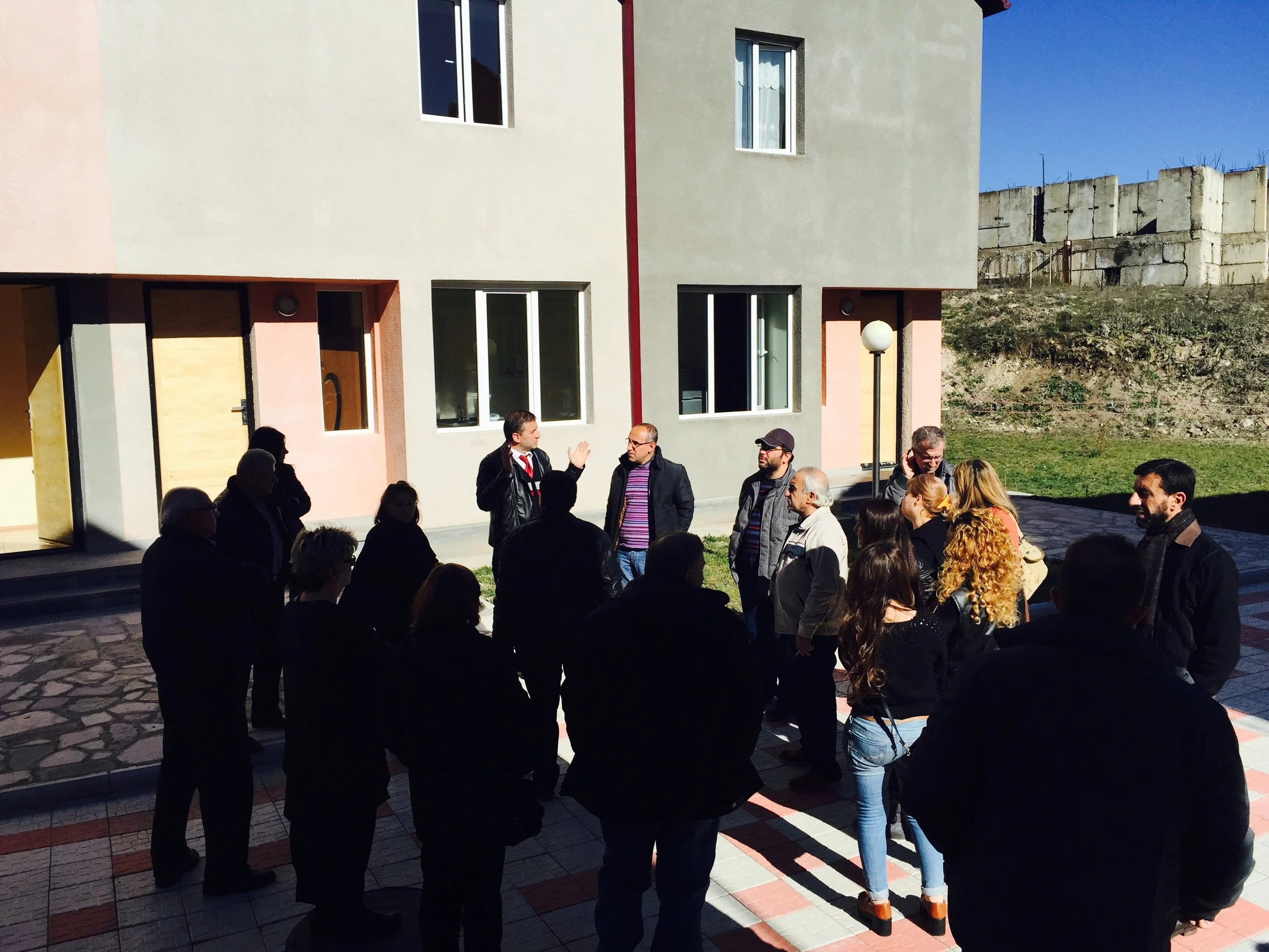 Askhen and other Syrian refugees on their first trip to Dilijan listening to Mr. Ara Nazinyan from ASBA