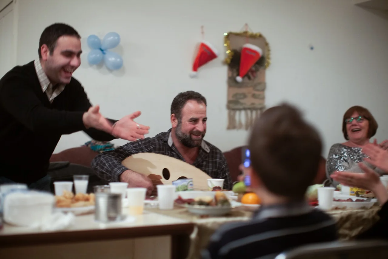 Syrian refugees in Armenia celebrating the holidays. Photo credit Eric Grigorian on assignment for the Armenian Redwood Project