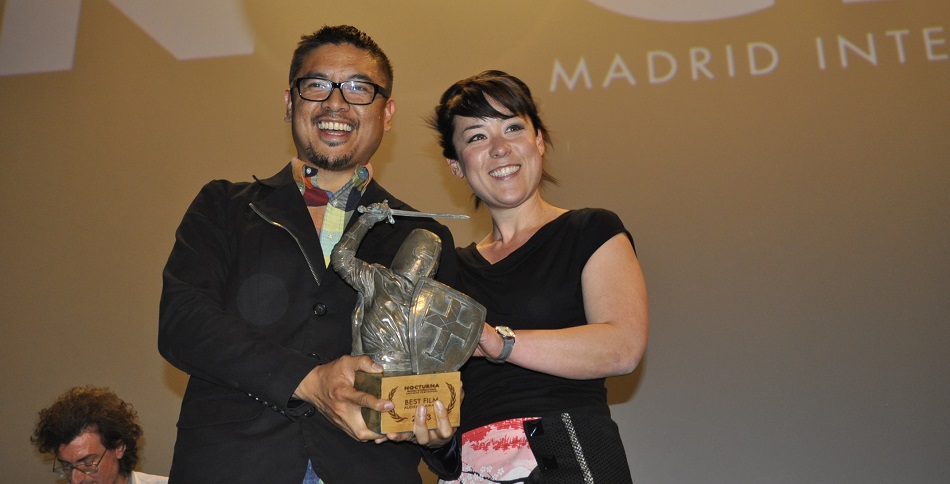 H.P. Mendoza and Anna Ishida receiving the award for BEST FILM, Audience Award at Nocturna: Madrid International Fantastic Film Festival.