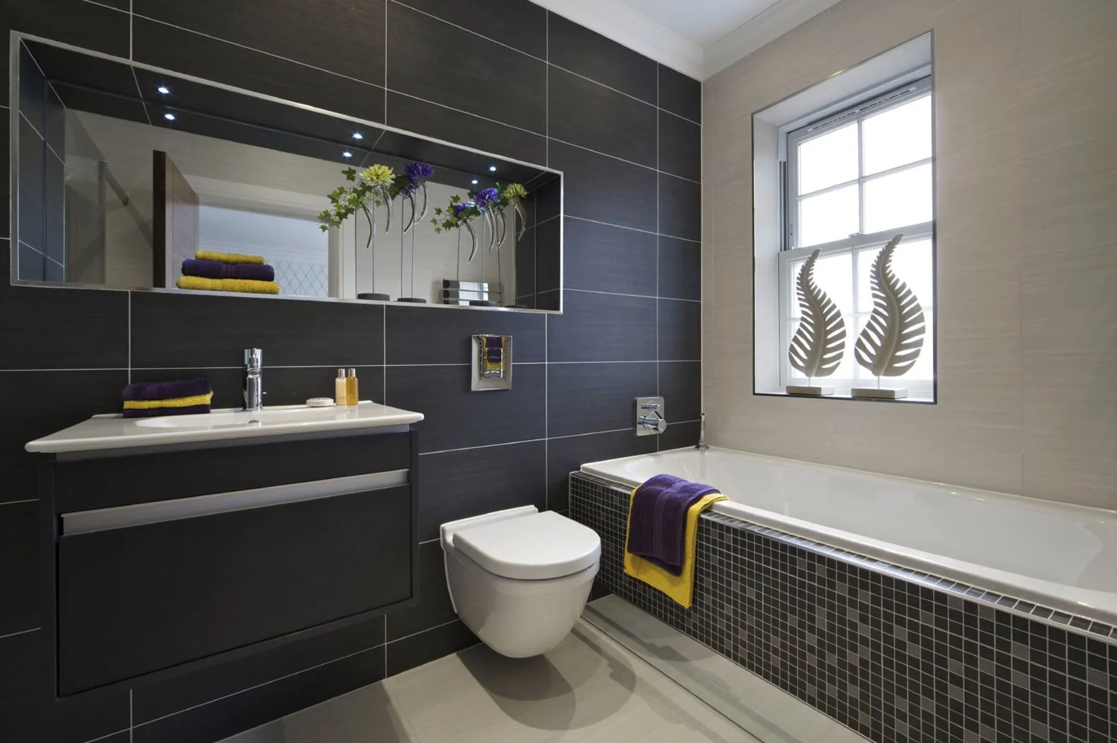 bathroom-modern-cool-black-and-grey-minimalist-bathroom-design-with-nice-wall-mounted-vanity-and-cabinet-wall-mounted-toilet-and-beautiful-rectangular-bathtub-design-with-cool-tiles-beautiful-dream.jpg