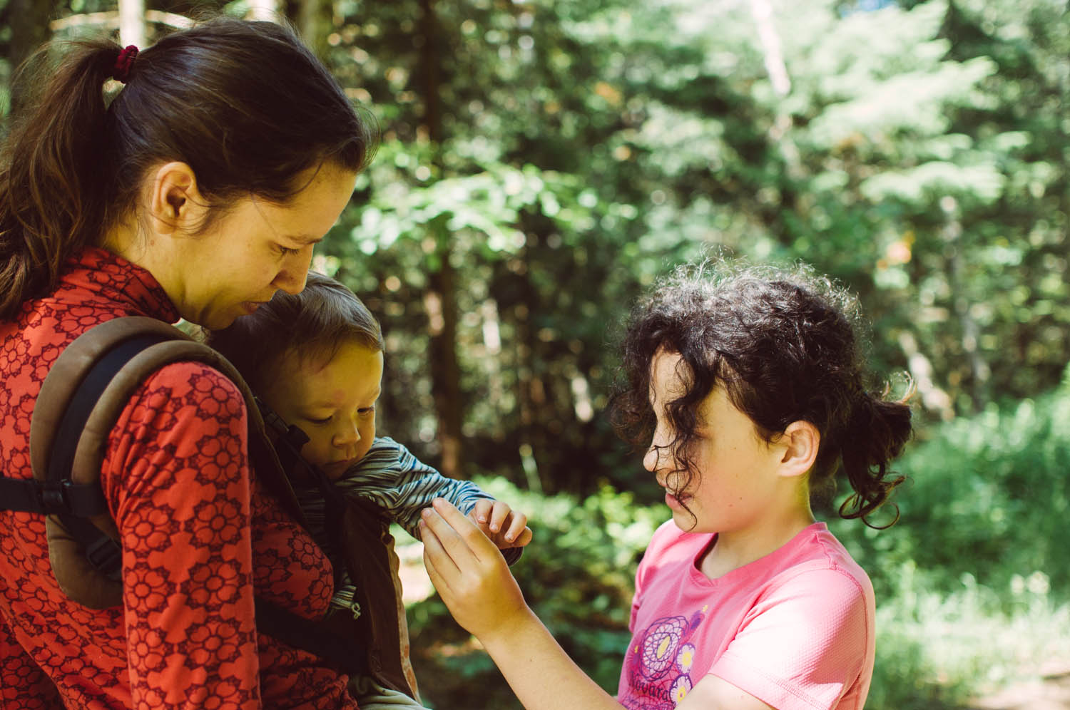 The girls kept picking wild strawberries for Jacob who was delighted