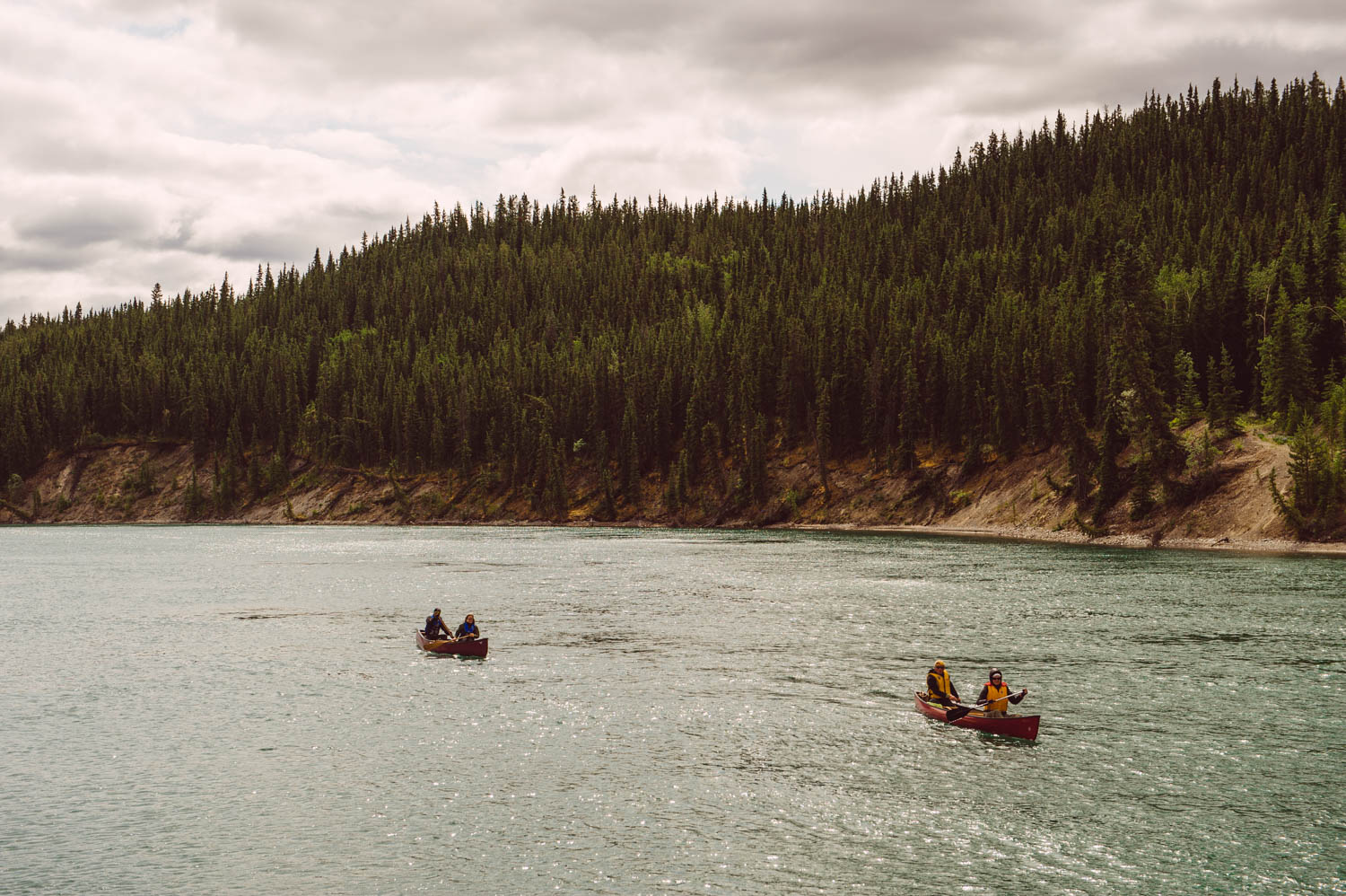 Paddling down the Yukon river on a cold Saturday afternoon, that's living On Yukon Time!
