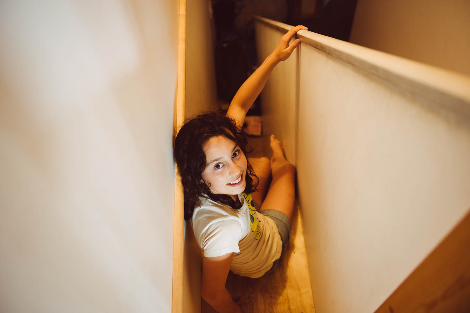 A house with a slide beside the stairs? Yes, please!