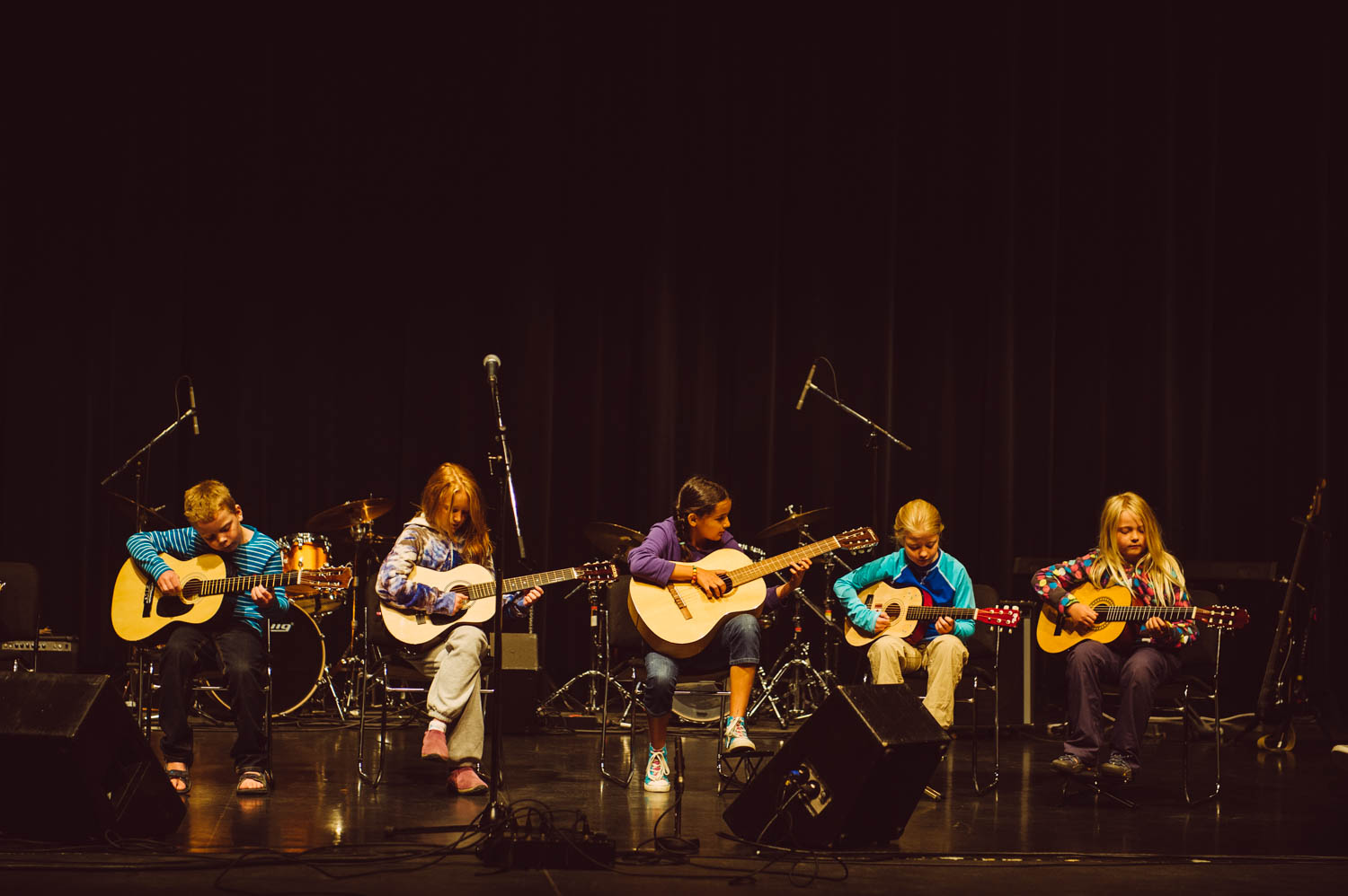 She did her guitar concert on the big stage of the Yukon Art Center.