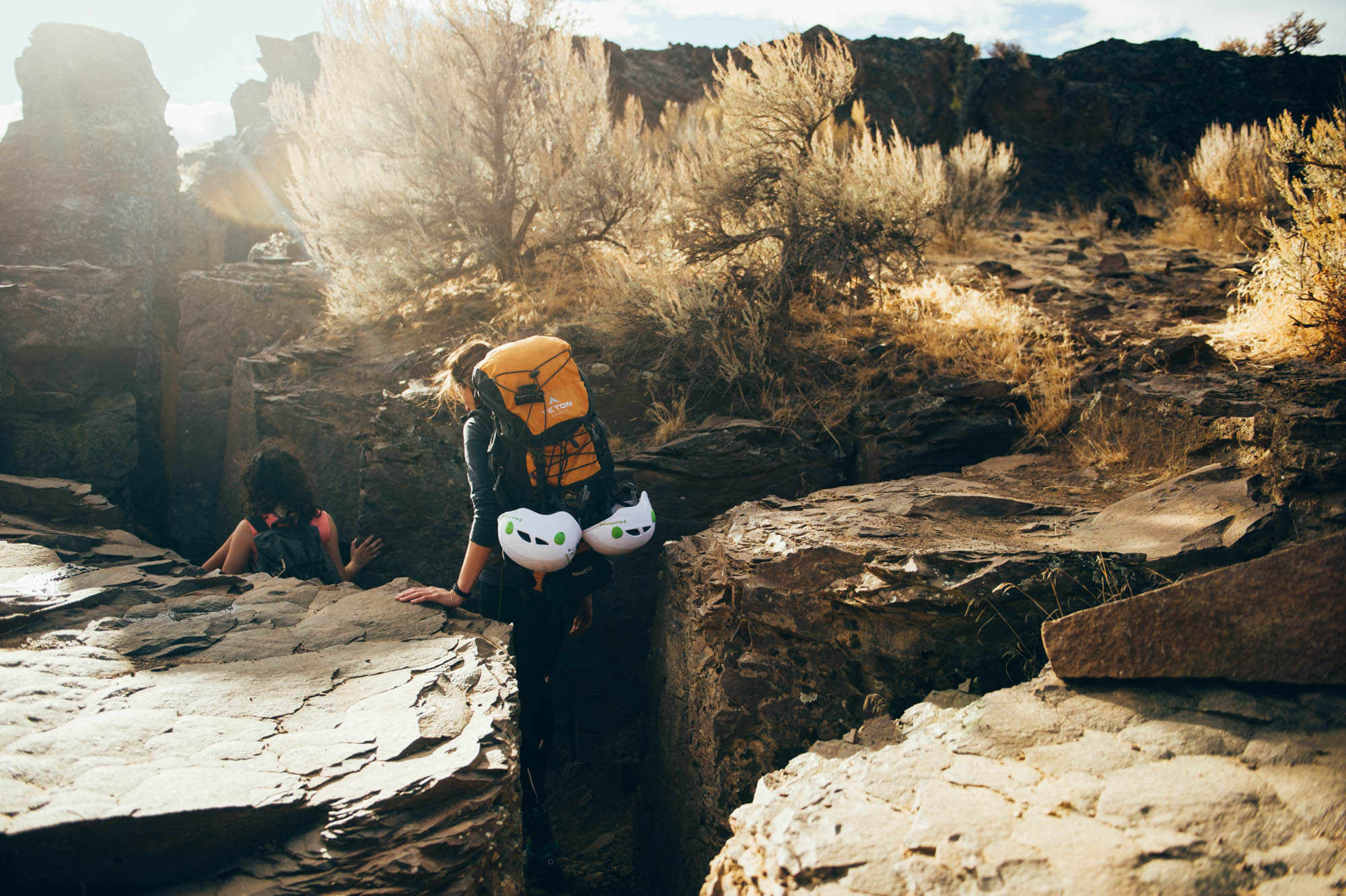 We have to go through a short (and very narrow!) slot canyon to get to the wall. There was a drop at the end and we had to carry Java down. He was NOT impressed...