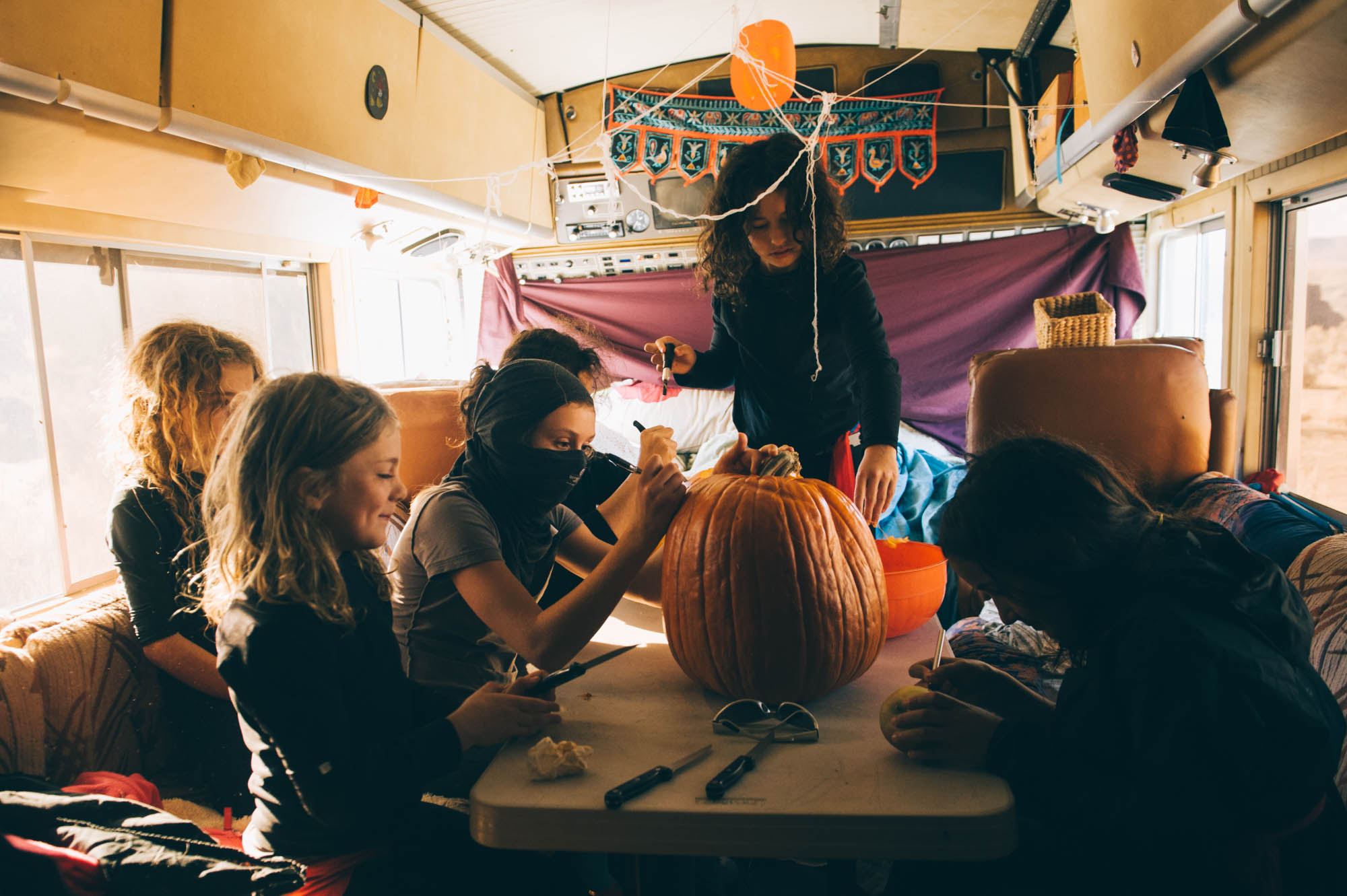 The wind was so crazy that day, we had to move the ninjas inside to finish the pumpkin carving... It was like a desert-storm, sand whisking our faces and all. The ninja costume was perfect!