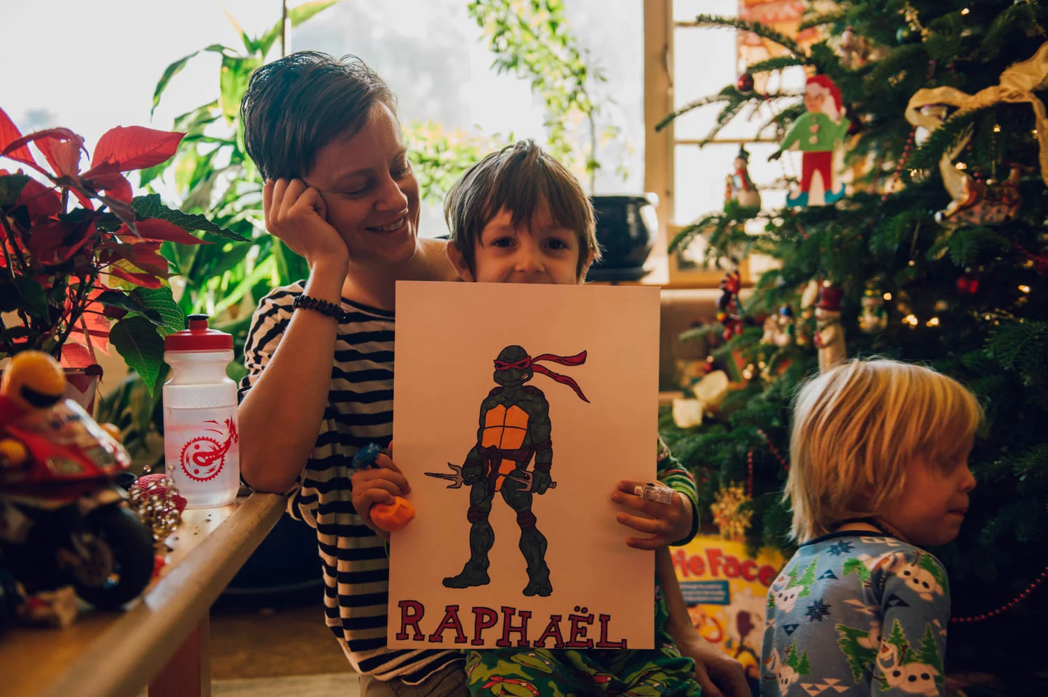 Aisha drew a Ninja turtle for Raphael.