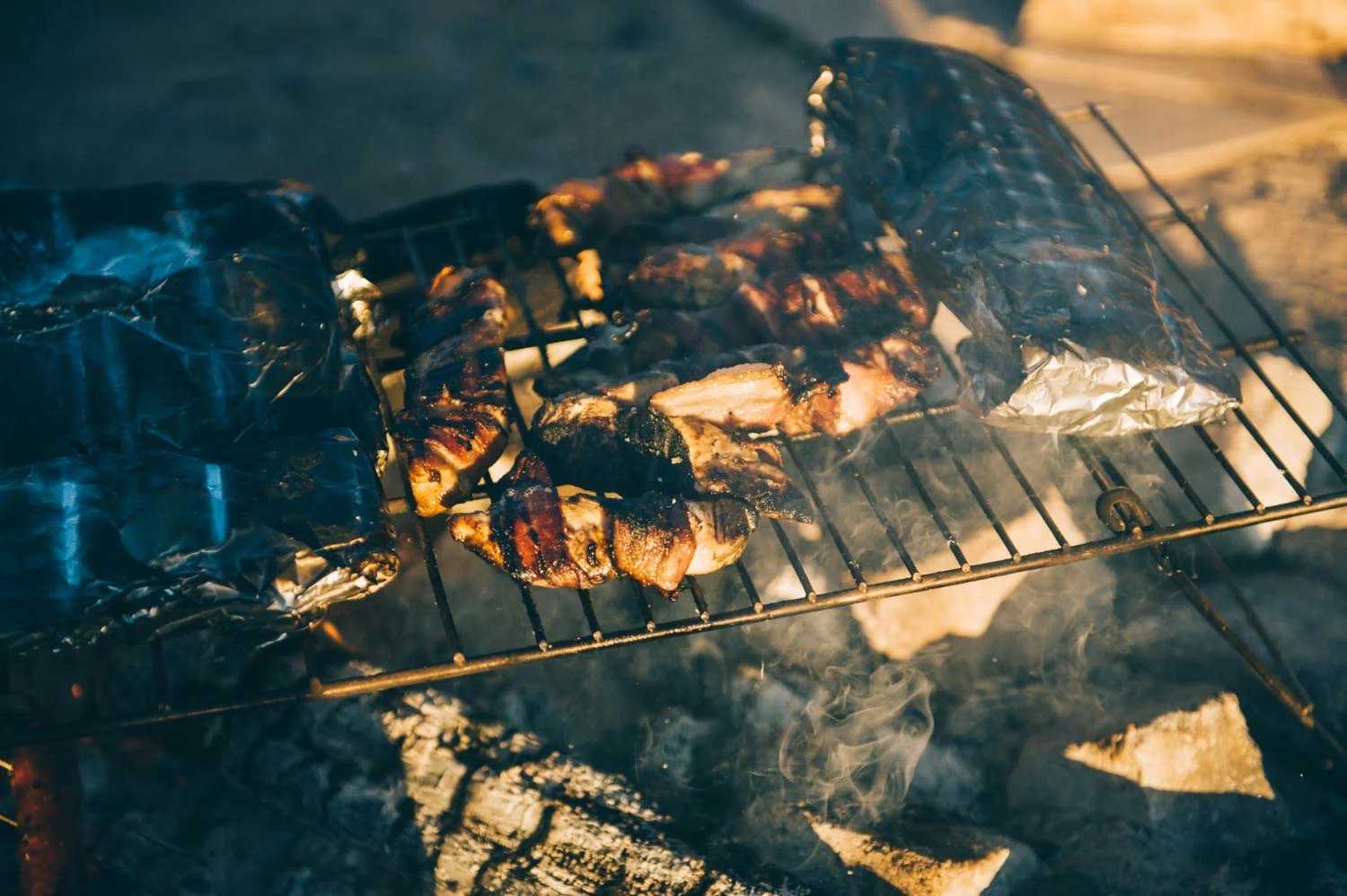 The man was grilling bacon-wrapped chicken... We might buy bacon only once every 2-3 years, but when we do, we eat it in style!