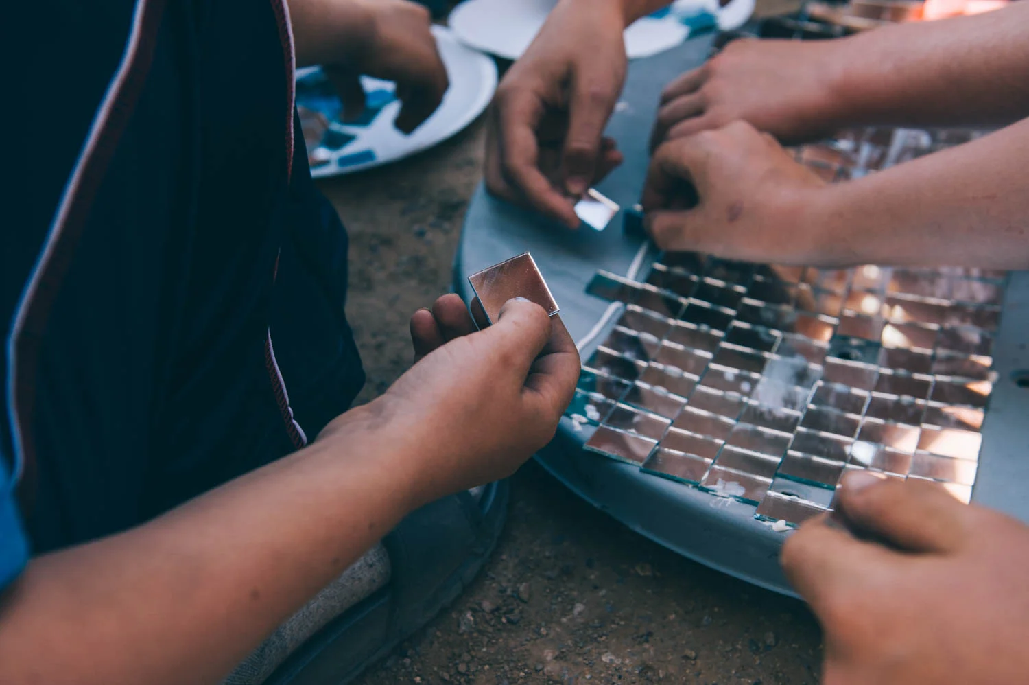 An old satellite dish and miror pieces for an even more powerful solar oven!