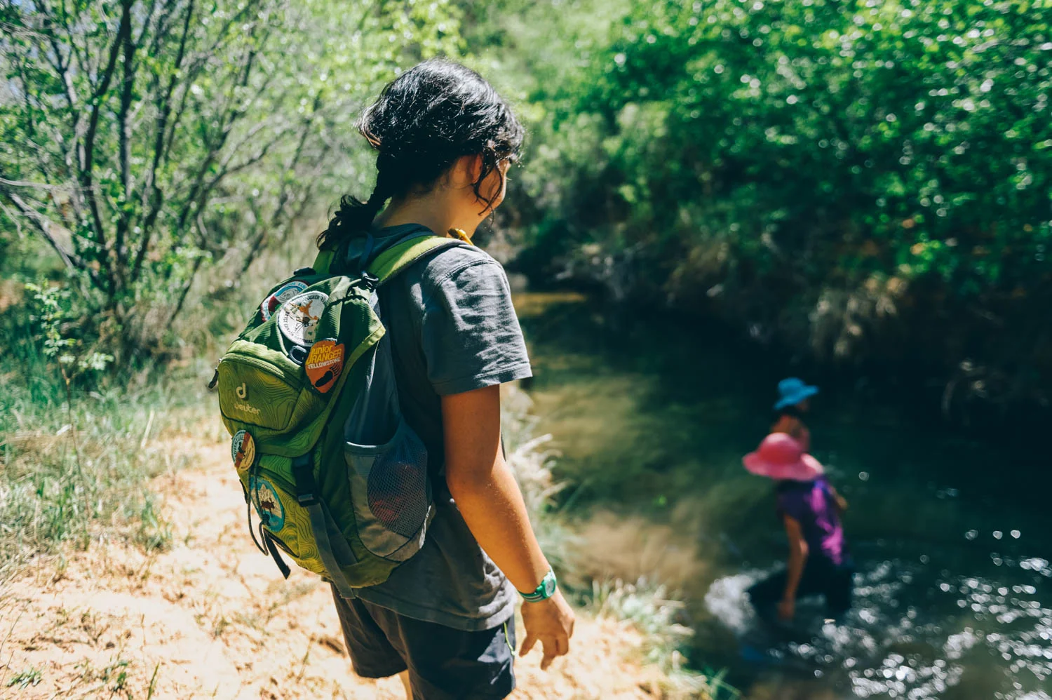 In the beginning, we all felt like Aïsha: not sure I want to get wet and hike all the way with wet shoes and wet clothes... but it didn't take long that we were all standing knee deep in the water!