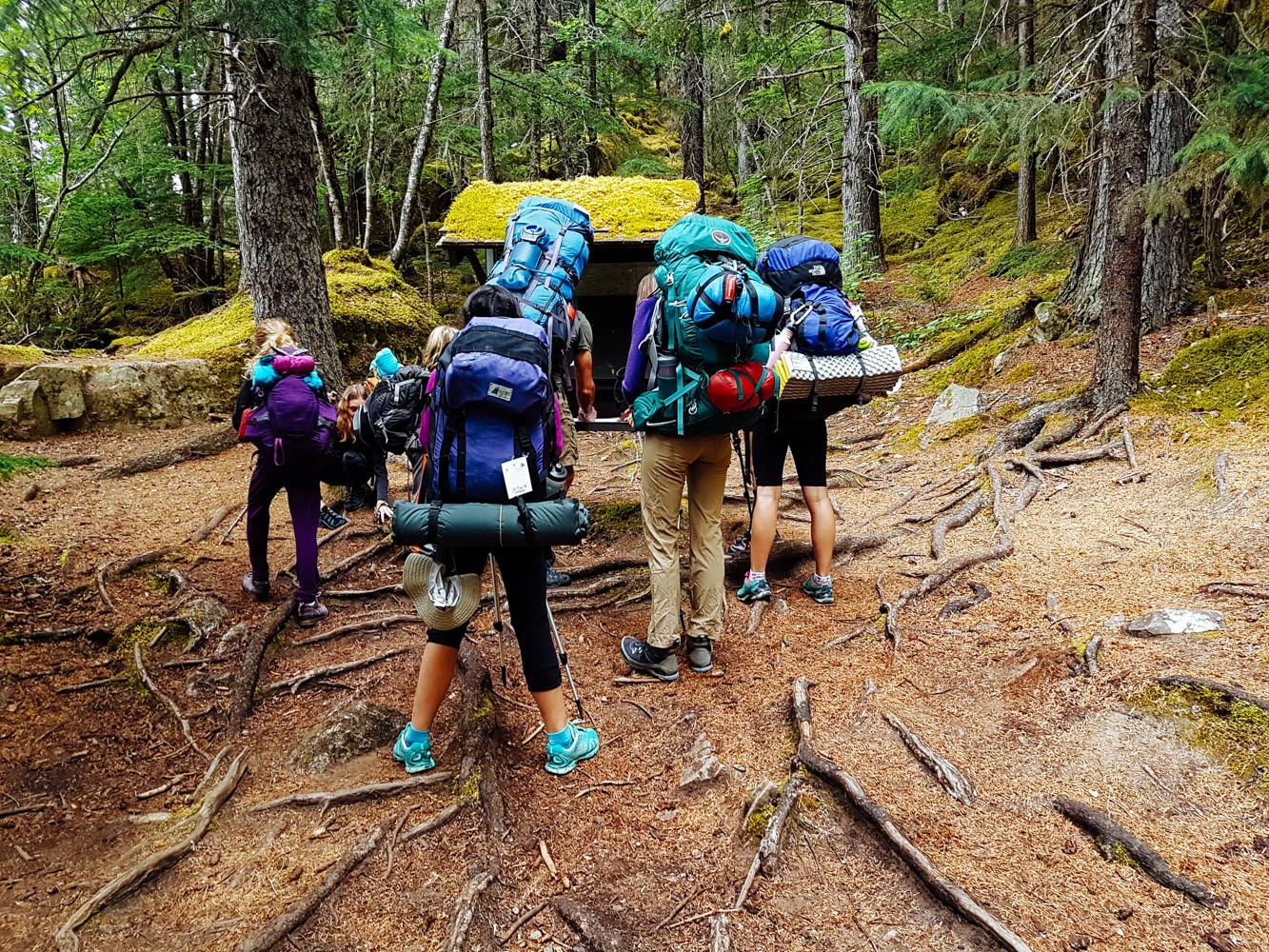 Signing the trail log.