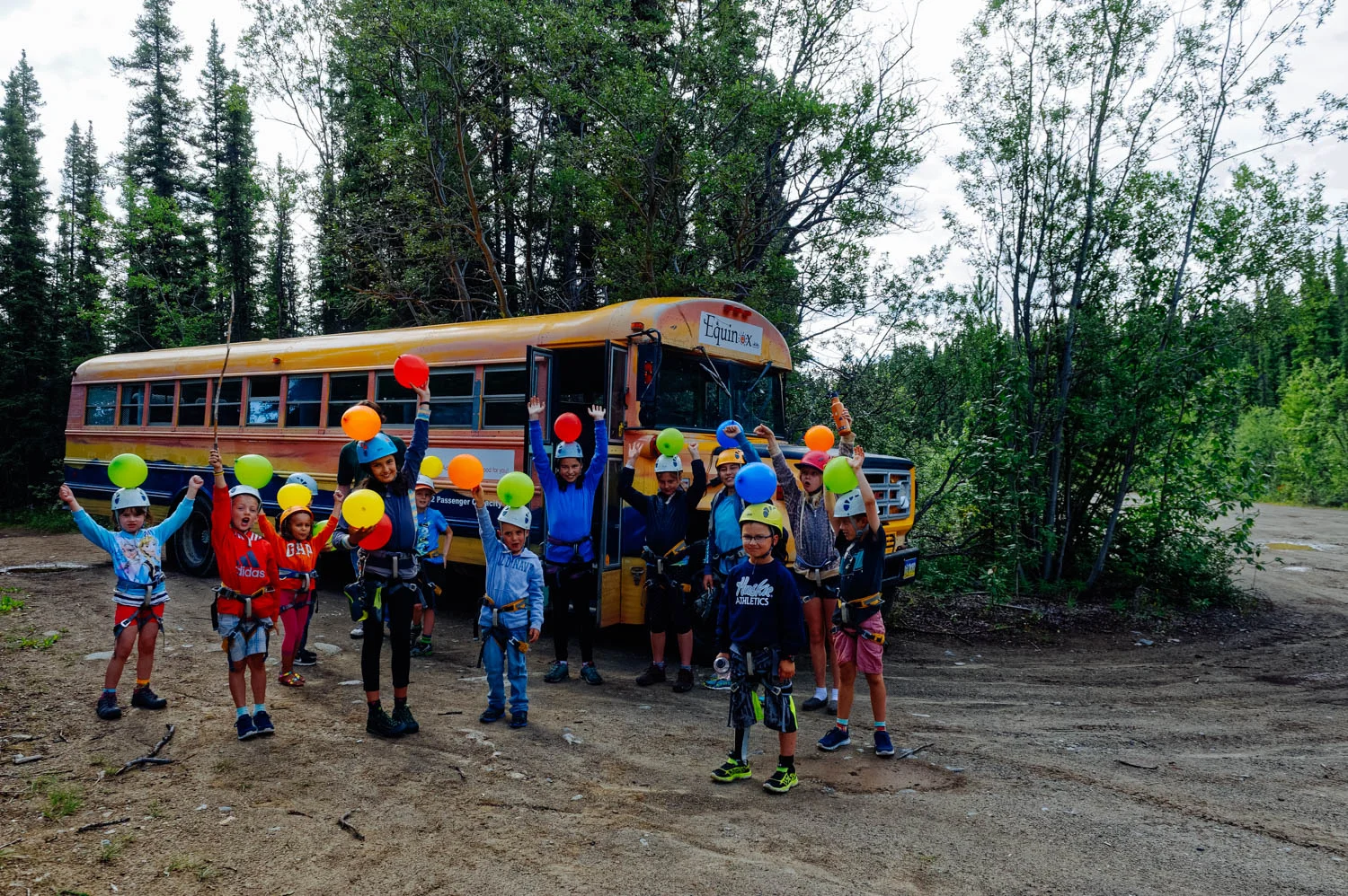 What are these kids doing with balloons on their heads? Sticking them on top of the route they climb. On their next climb, they can pop one if they make it to the top again!