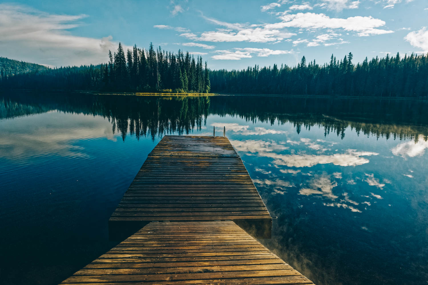 Kager Lake, right by the campsites at Boer Mountain. There are tent campsites all around the lake accessible through a fun bike trail. During our time there, they were doing controlled burns all around the lake and it was pretty surreal to come acro…