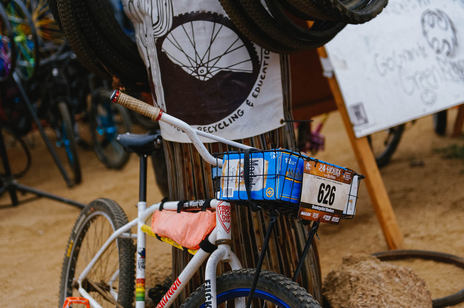 Single-speed rigid bike with a 12 pack of beer. To each their race.