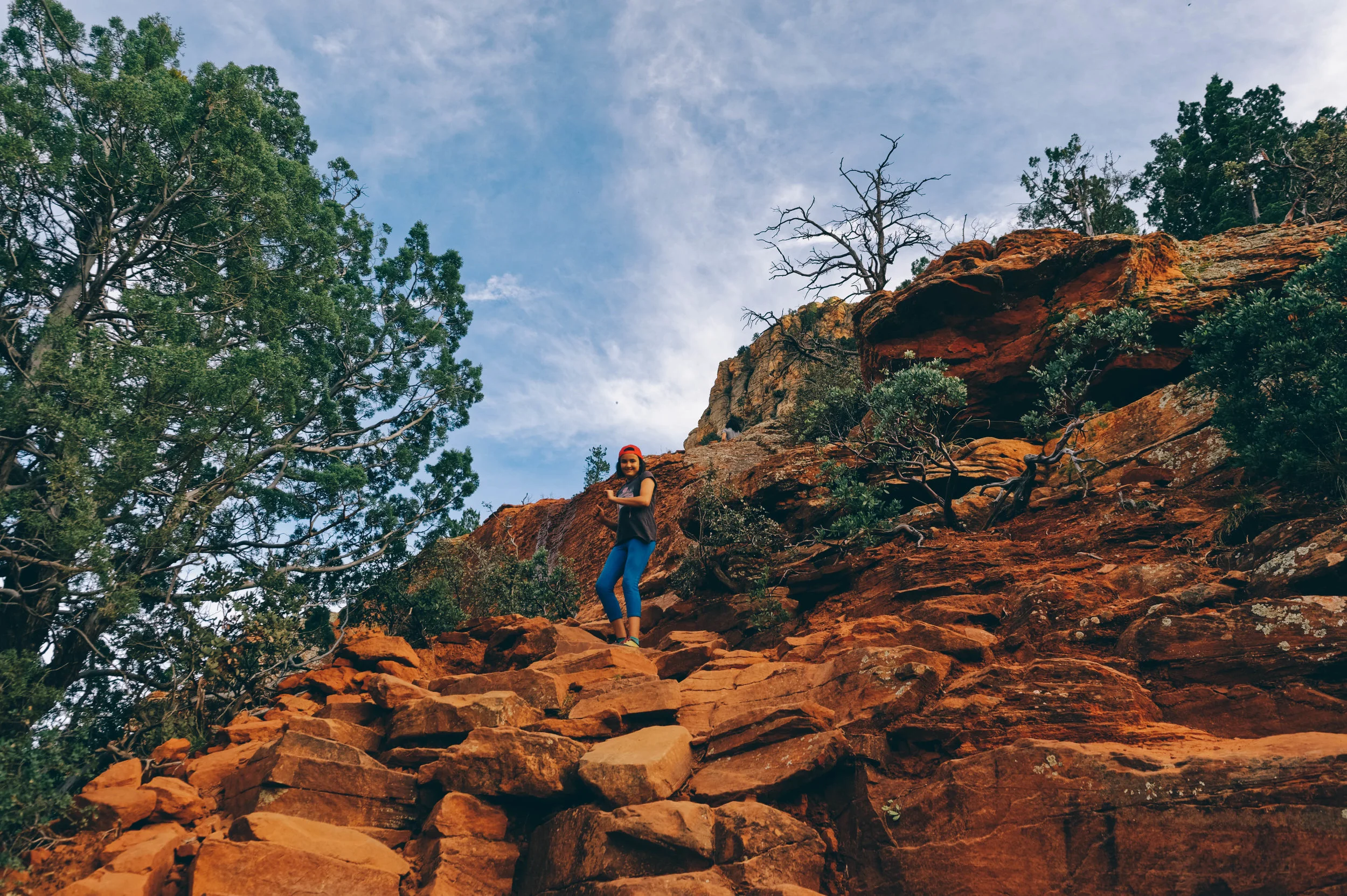 Red rock scrambling on the Devil's Bridge hike.