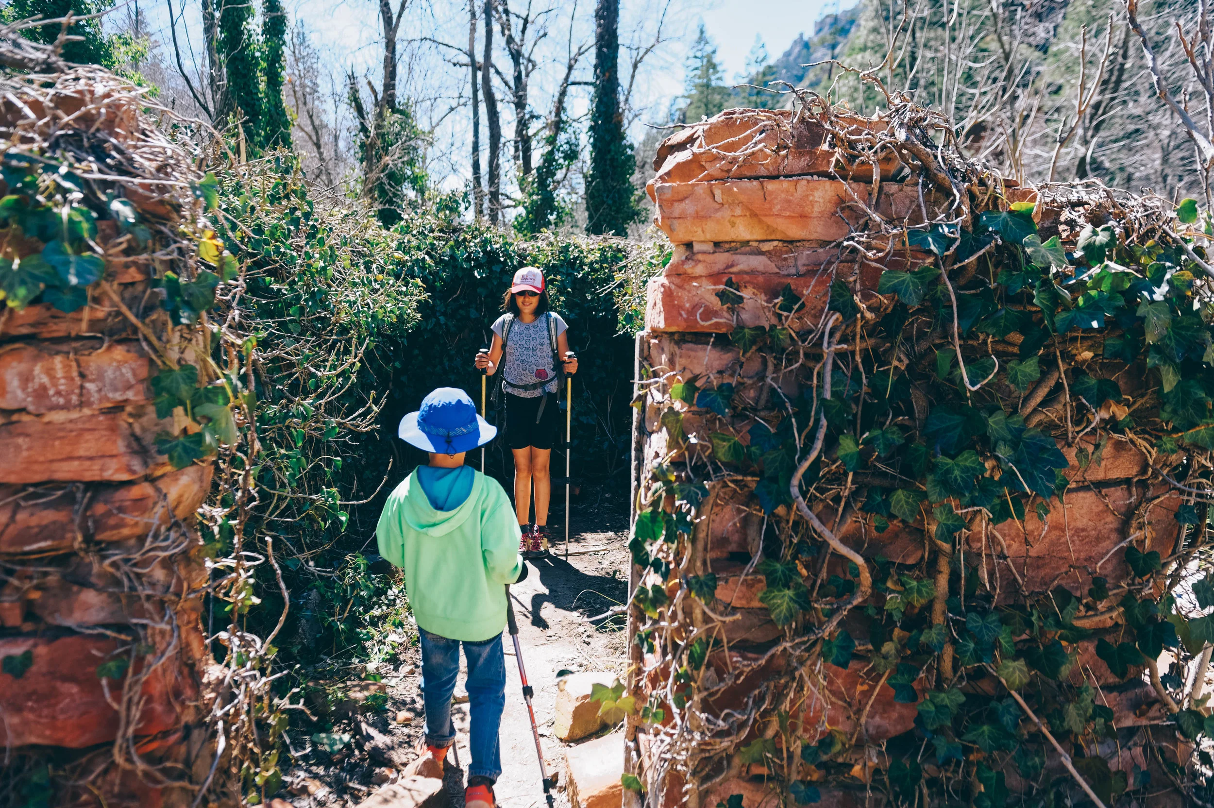 Exploring ruins on the West Fork Trail.