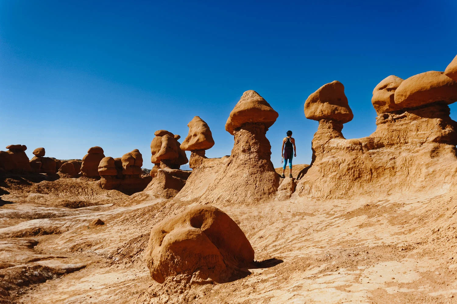 Walking through Goblin Valley is a must! Go early or even better, at sunset, to beat the crowd.