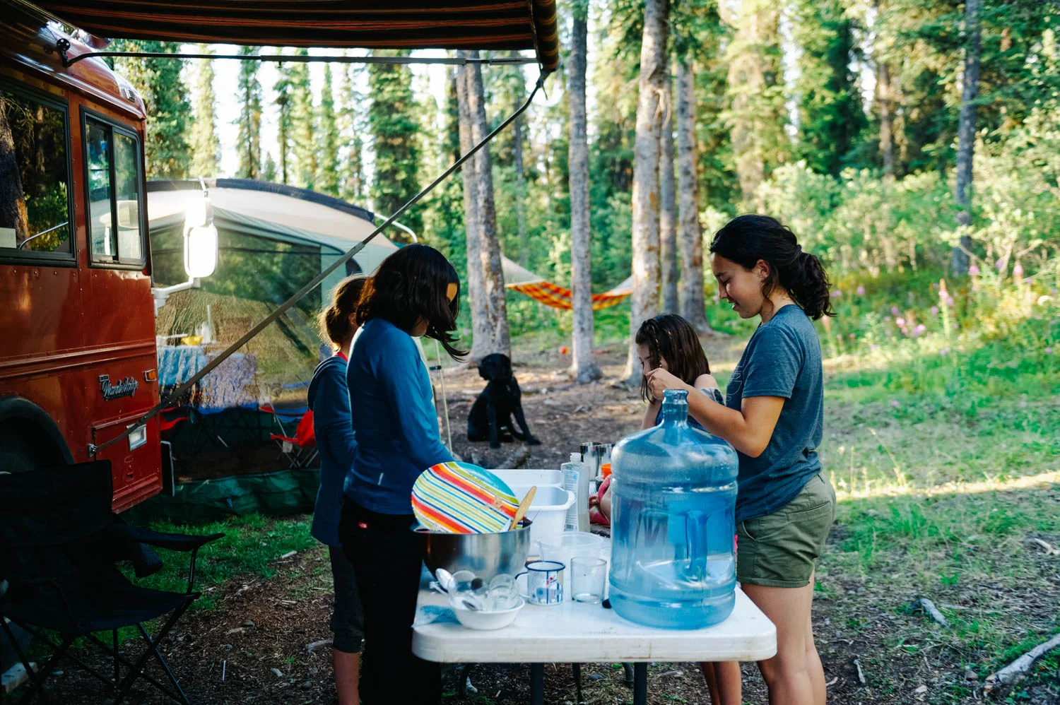 Our friends were traveling up the Cassiar and we met at Morchuea Lake for a night. Here, the girls were doing the dishes together.