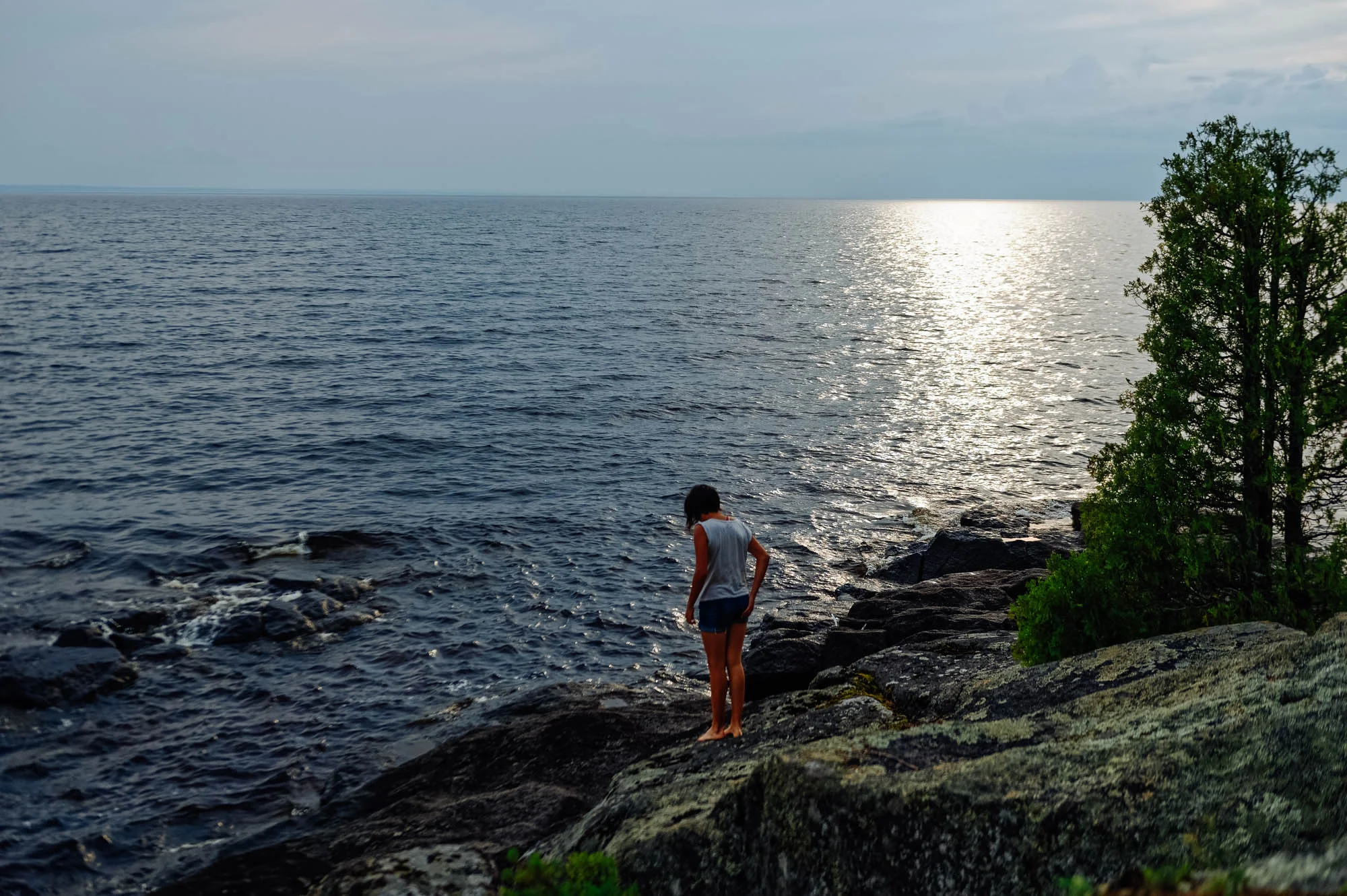The girls and I loved to go sit on the warm black rocks after sunset.