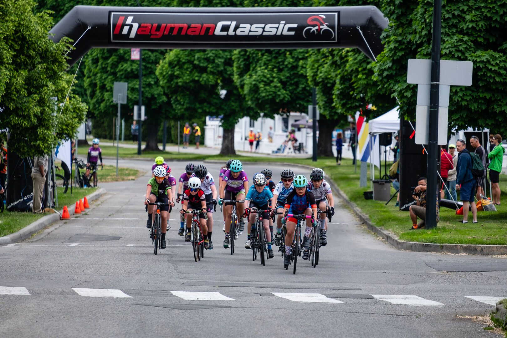 Mathilde (center in purple + turquoise helmet) taking the start of the crit. Photo by Cody W Gannon.