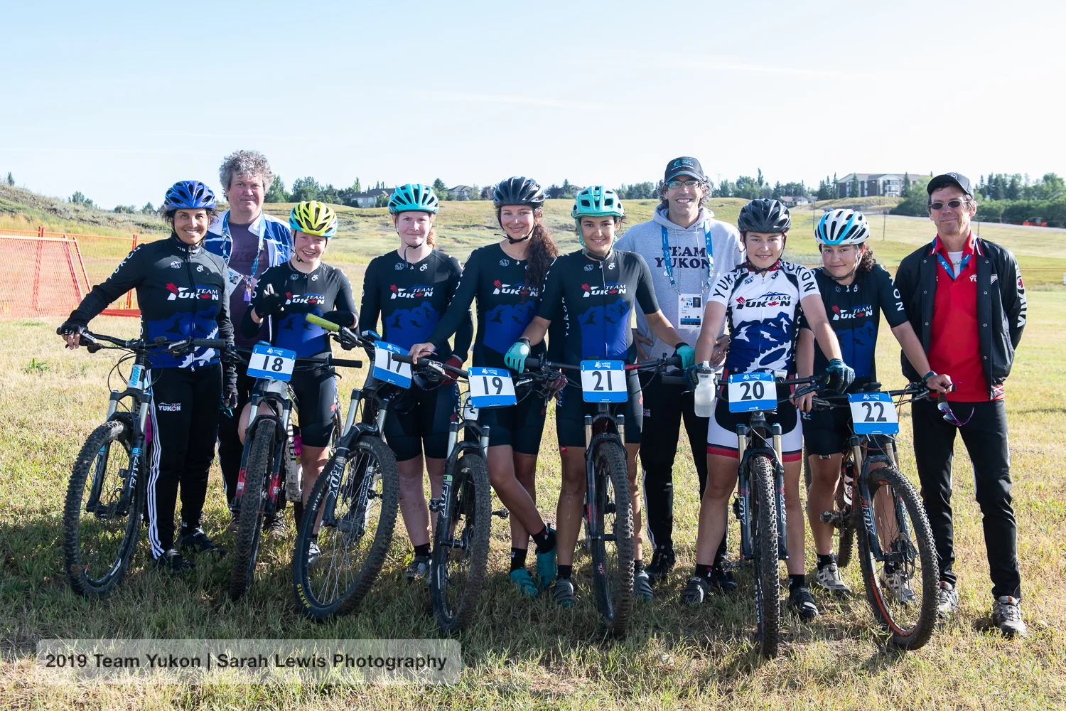 The whole cycling team: Coach Trena on the left, Dean the mechanic, Tori, Veronica, Ava, Mathilde, JF (mission staff), Mara, Aïsha and Peter (team manager).