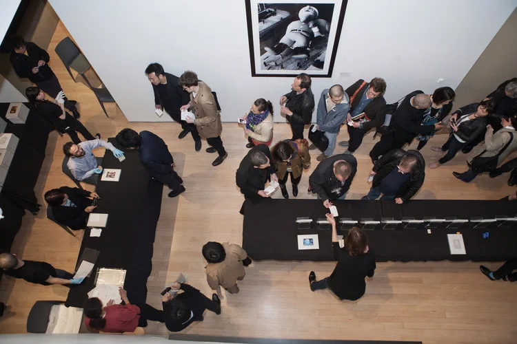 At the front of the line, participants had their book stamped with the title "COLOR" and then signed by Daido.
