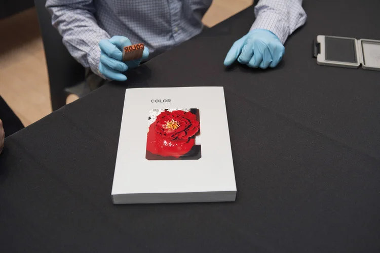 During the event, the front cover was also stamped with the title.