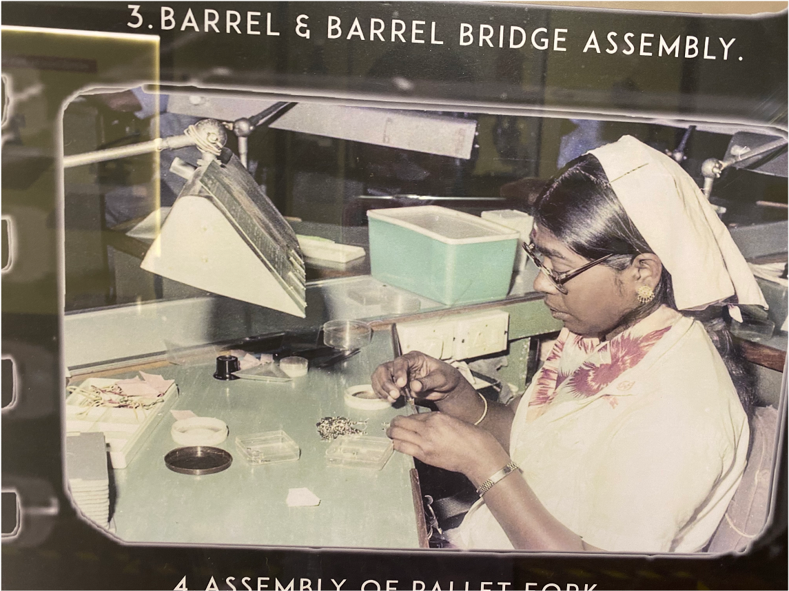 woman at work in HMT.png
