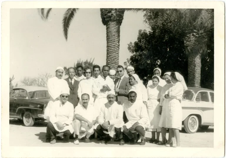 Frantz_Fanon_with_medical_team_at_Blida_1953-1956.jpg