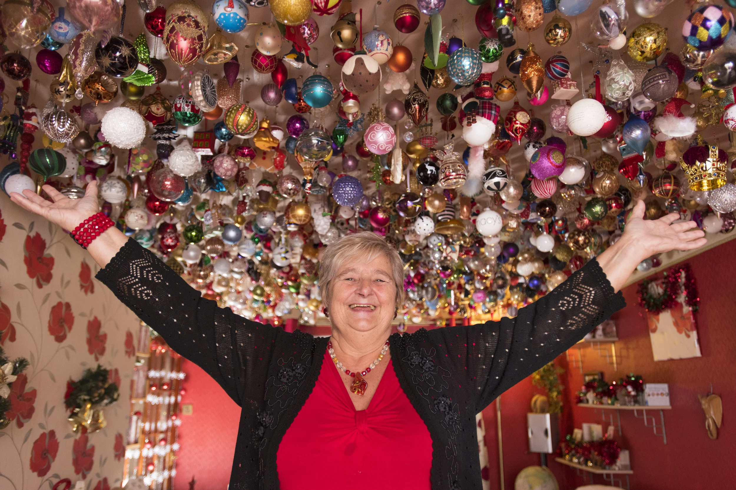 Christmas-loving grandmother Sylvia Pope of Morriston, Swansea, has 2061 Christmas baubles hanging from her ceiling. (Photo by Matthew Horwood)