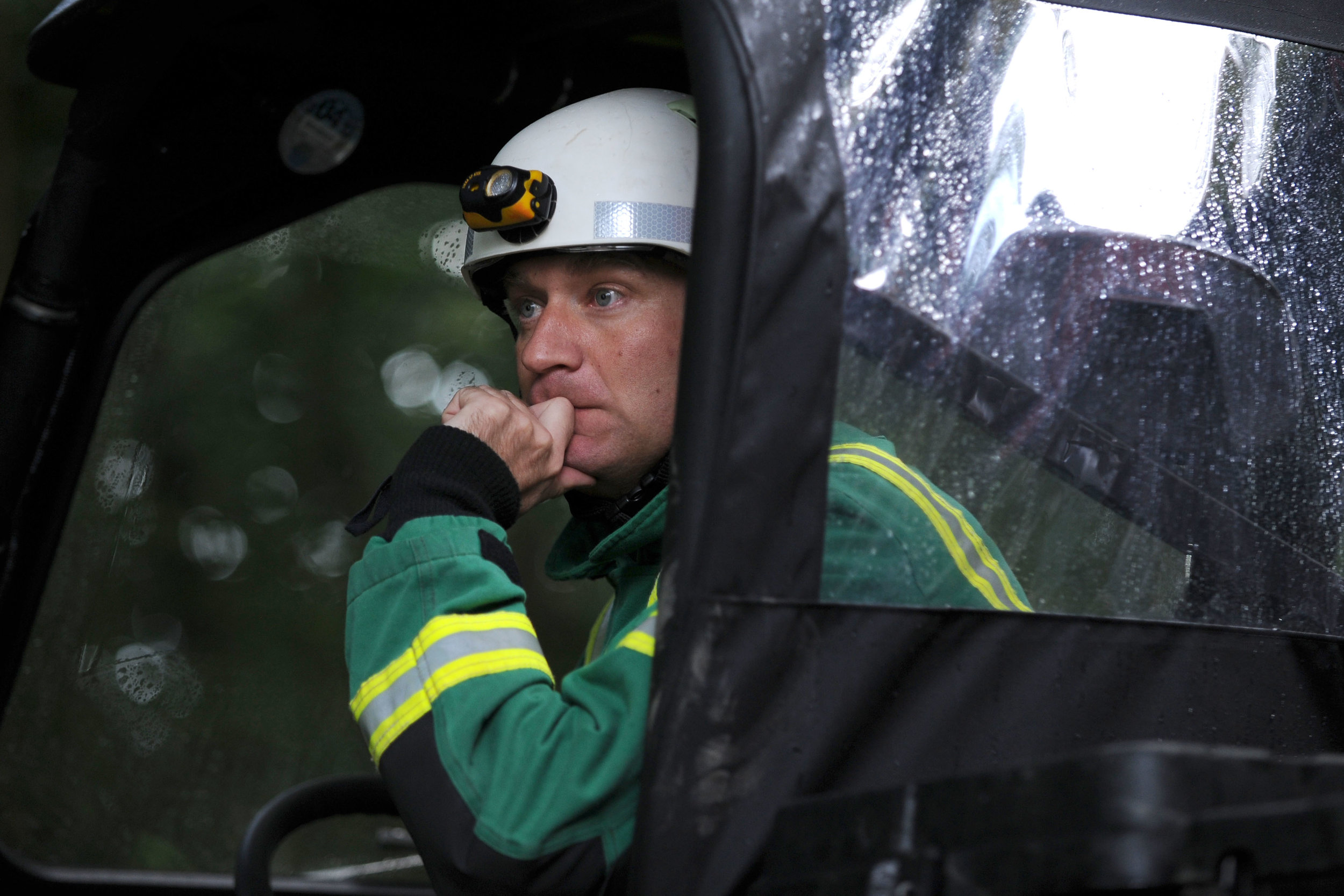  150911

Four miners have died in the Gleision Colliery near Cilybebyll, Pontardawe. Yesterday the entrance to the mine became blocked by a flood.

Picture shows an exhausted rescue worker.

PIC: Matthew Horwood / Media Wales

-  