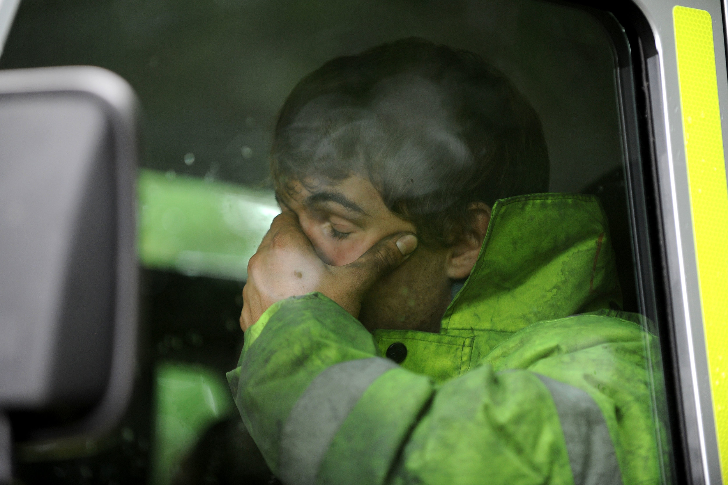  150911

One miner has died in the Gleision Colliery near Cilybebyll, Pontardawe. Yesterday the entrance to the mine became blocked by a flood.

Picture shows a rescue worker making his way up to the colliery.

PIC: Matthew Horwood / Media Wales

-  