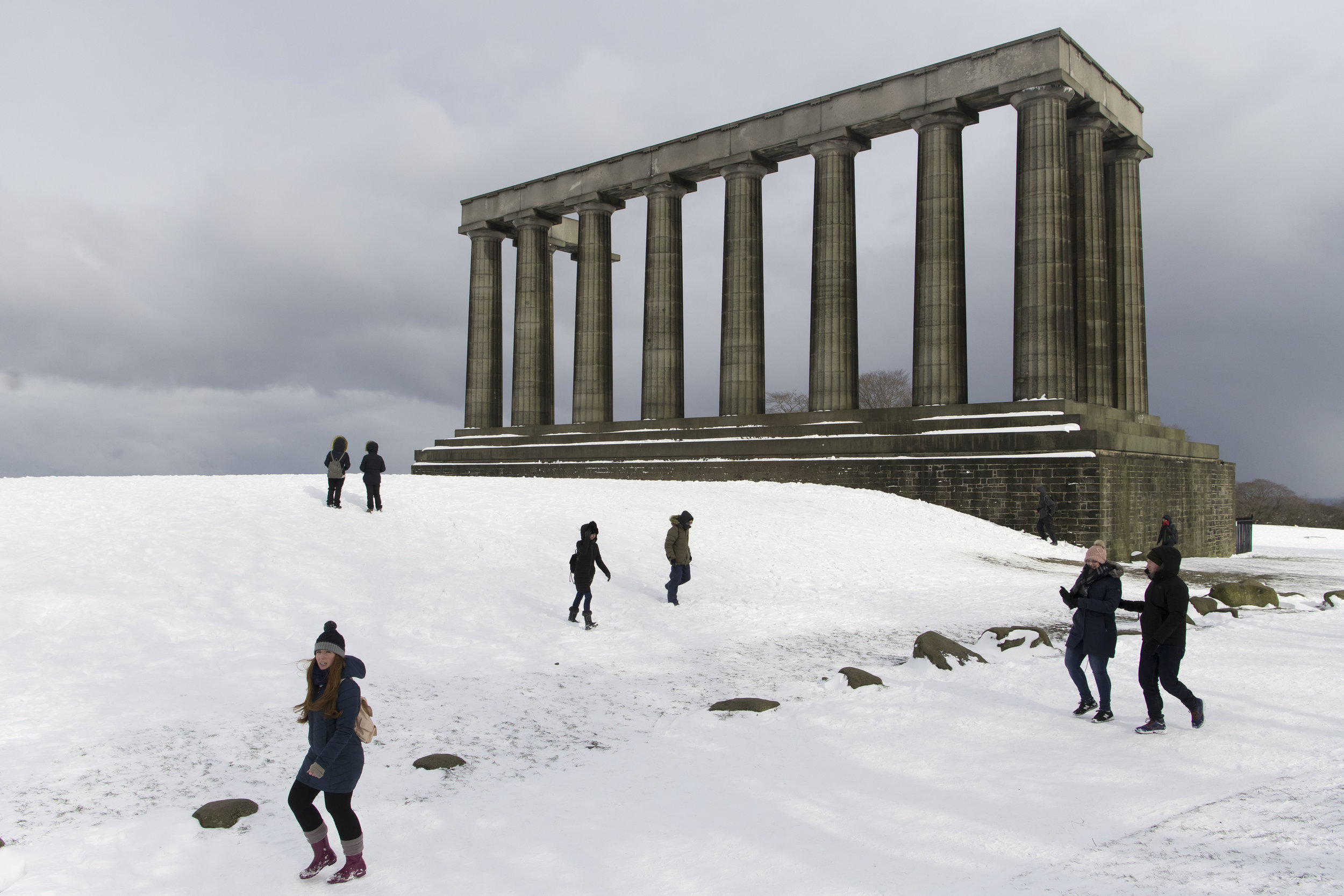  EDINBURGH, SCOTLAND - MARCH 1: A National Monument seen covered in snow at Calton Hill which overlooks the city centre following heavy snowfall on March 1, 2018 in Edinburgh, United Kingdom. People have been warned not to make unnecessary journeys a