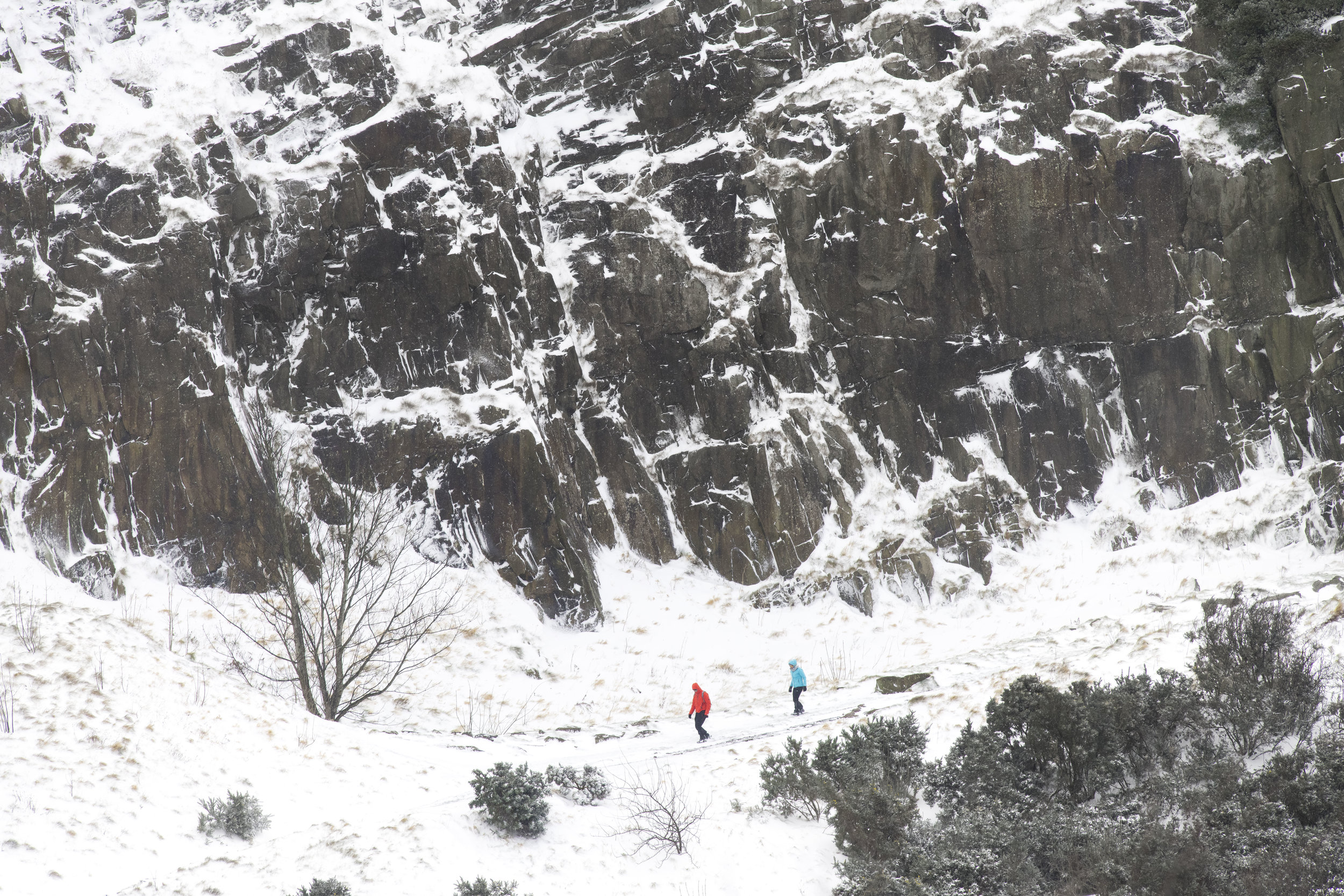  EDINBURGH, SCOTLAND - MARCH 1: Walkers seen in Holyrood Park, home of Arthur's Seat, on March 1, 2018 in Edinburgh, United Kingdom. People have been warned not to make unnecessary journeys as the Met office issues a red weather be aware warning for 