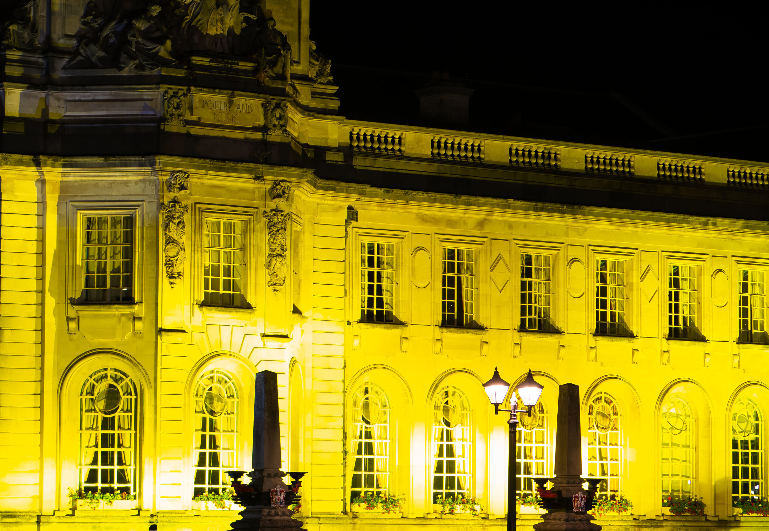  CARDIFF, WALES - JULY 29: Cardiff City Hall is seen illuminated in yellow light following cyclist Geraint Thomas' victory in the Tour De France on July 29, 2018 in Cardiff, Wales. Team Sky's Geraint Thomas, who was born in Cardiff, is the first Wels