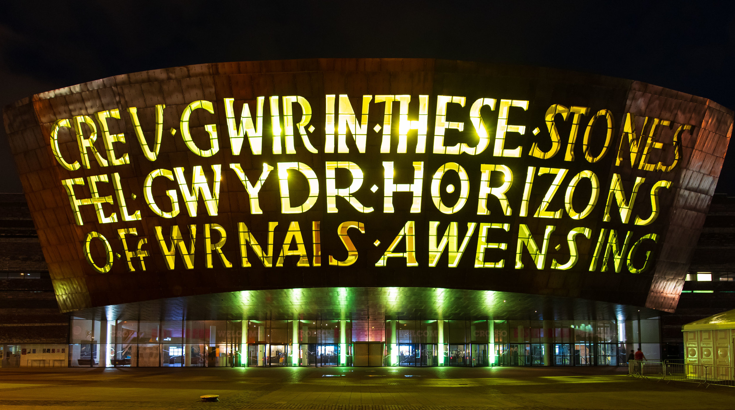  CARDIFF, WALES - JULY 29: The Wales Millennium Centre, Wales' national centre for performing arts, is seen illuminated in yellow light following cyclist Geraint Thomas' victory in the Tour De France on July 29, 2018 in Cardiff, Wales. Team Sky's Ger