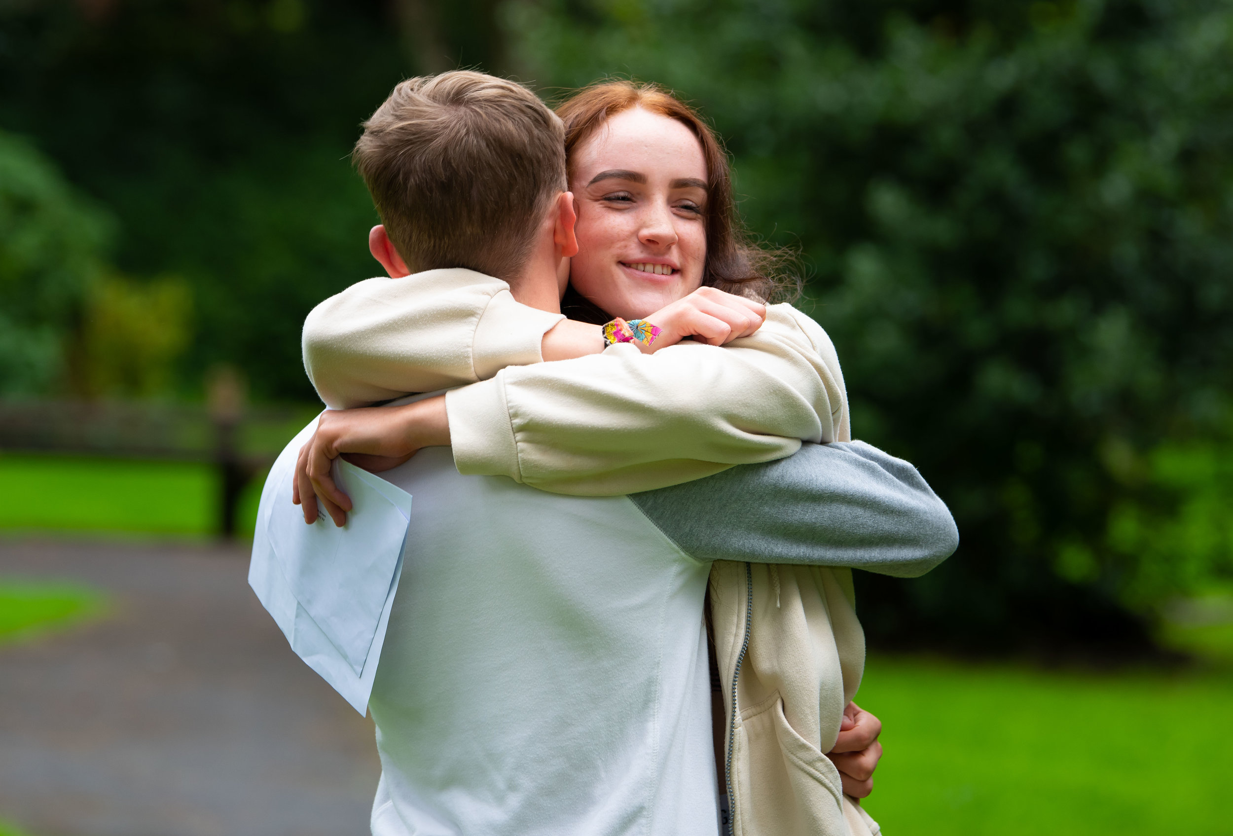  SWANSEA, UNITED KINGDOM - AUGUST 16: 
Immy Waldemar-Brown hugs Tyler Evanson on A Level results day at Ffynone House School on August 16, 2018 in Swansea, United Kingdom. A level examination has been changed in the past year as coursework has been d