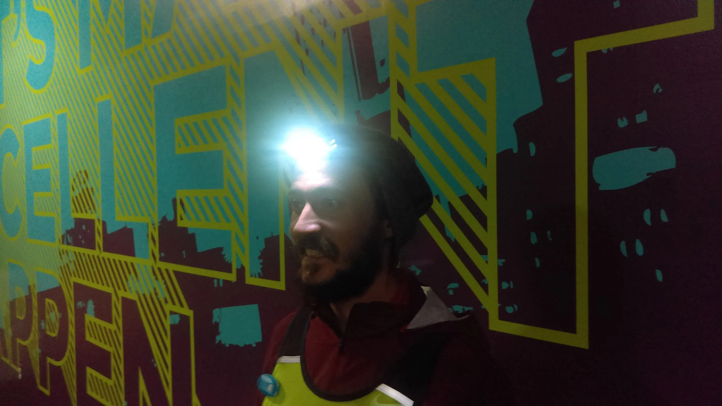 Here you can see a very enthusiastic Jason wearing one of the rechargeable headlamps we carry at the store, which actually has 3 steady light settings : low intensity (1st photo) medium and high intensity (2nd photo) and two blinking light settings . Lots of options to choose from, depending on where you are running and your visibility needs.