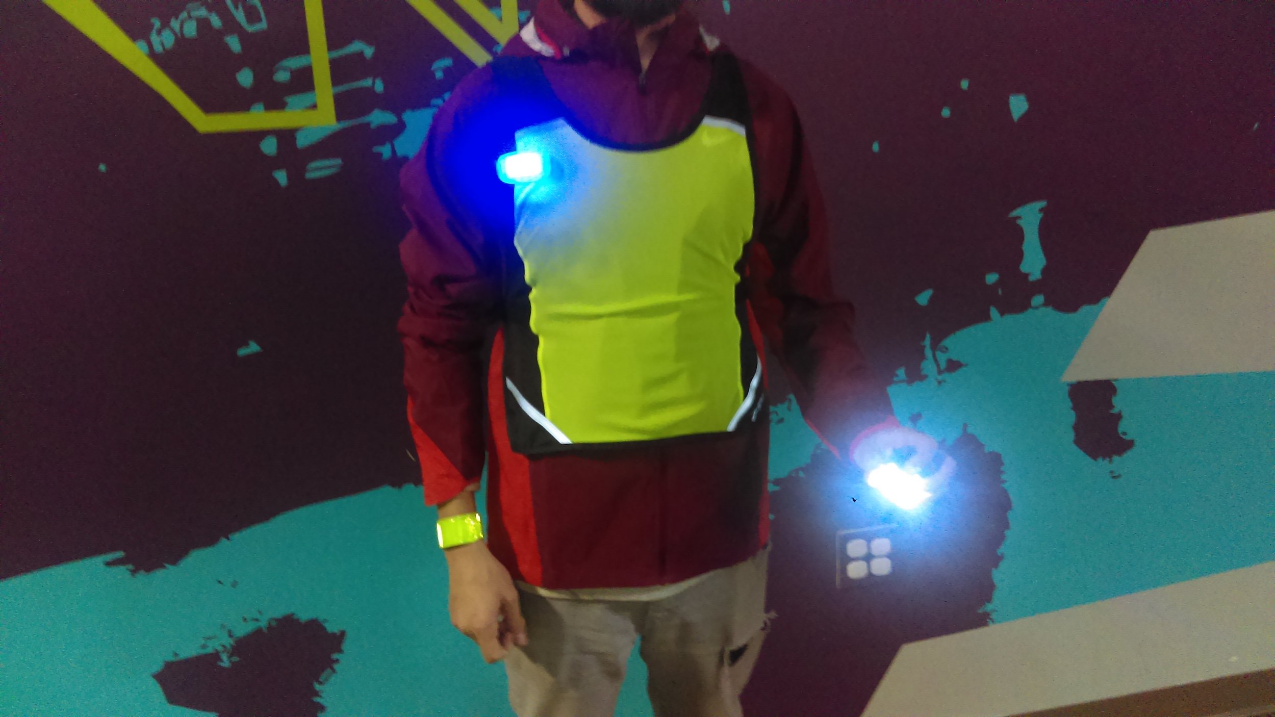 Here, Jason shows you the different varieties of clip-on lights that we carry at the store. The one in his left hand can be used both as a handheld and as a clip-on light and much like the headlamp, it has different light intensities and blinking light options. It’s also ergonomically designed and very comfortable to hold even during your longer runs.