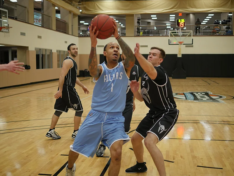 Steib drives to the basket as a member of the Polars in the UH Dream League
