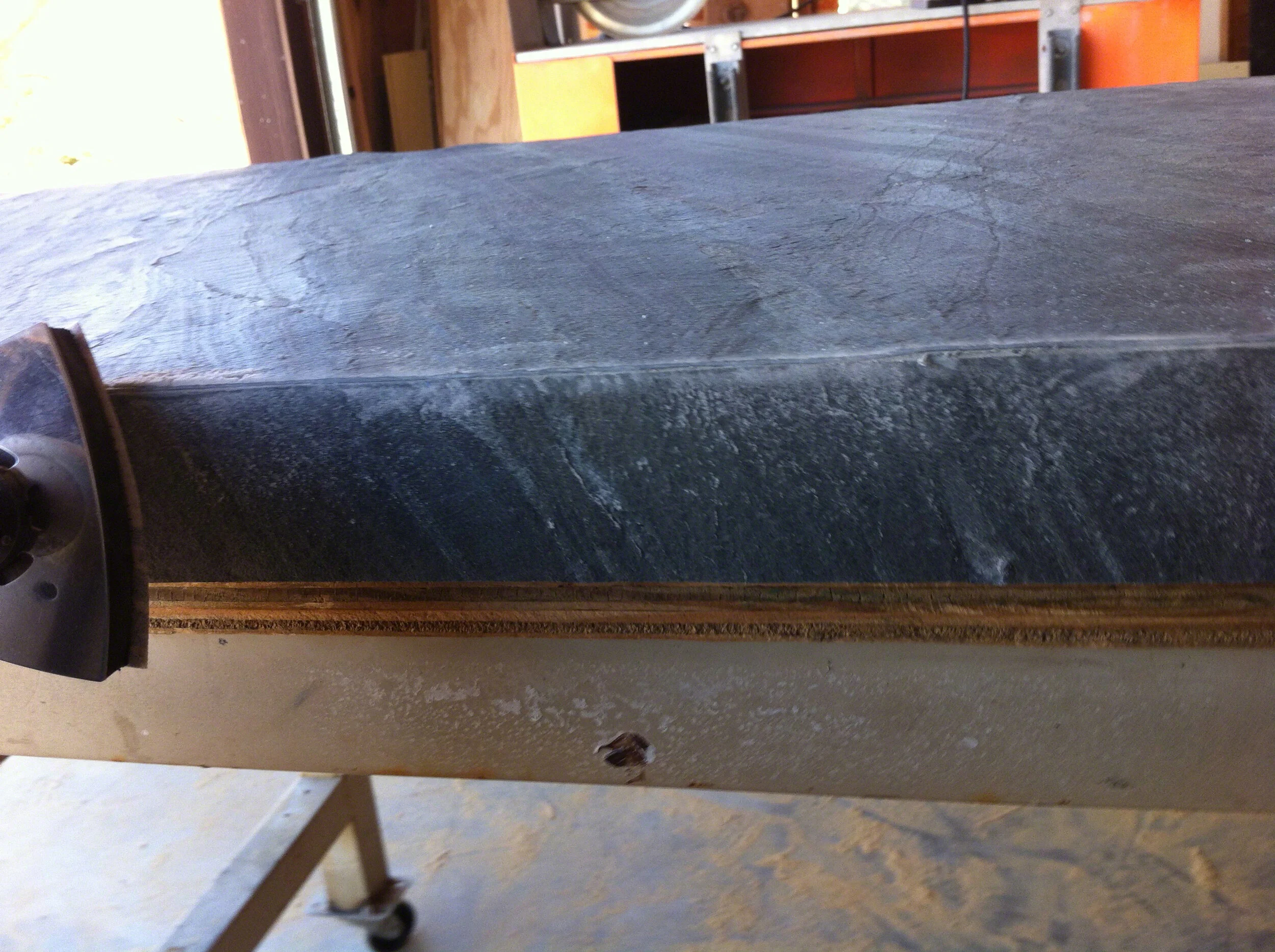 txtr-lite-flexible-stone-veneer-bathroom-vanity-wwusing electric sander to sand edges flush2 copy.jpg