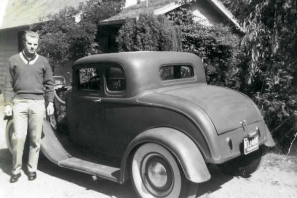 Roy has been crazy about cars even longer than he has been in the insurance business. His first personal car in high school in Gig Harbor, Washington, was a baby blue 1940 Plymouth. He can’t even remember all the cars he had when he was in high school and college. Here is a photo of Roy with one of his cars from when he was in his 20s. Isn’t he cute? He was working full time as a machinist for a tool and die maker while going to college. He was proud of his ’32 Ford five-window coupe, which was chopped and channeled.