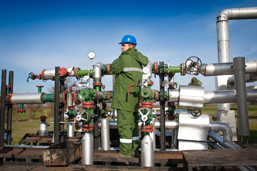 NG worker in green suit.jpg
