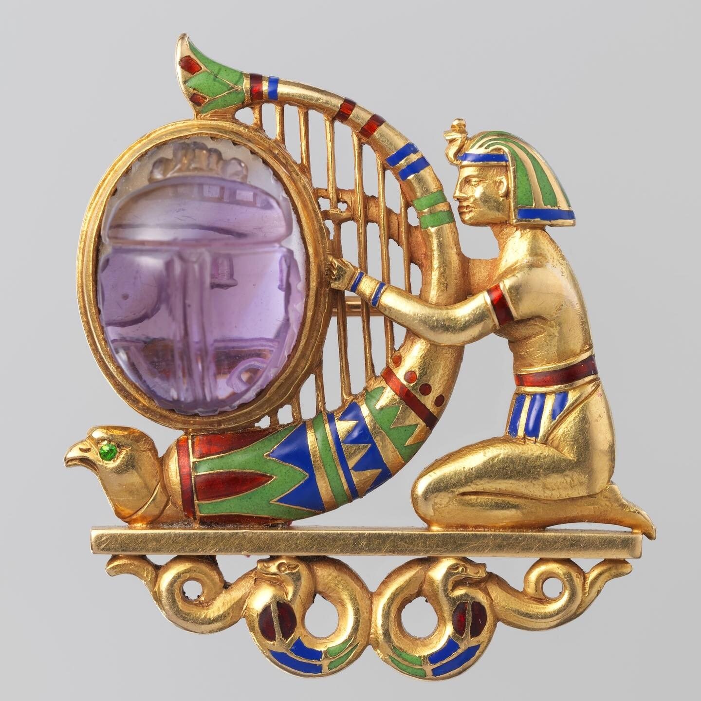 Brooch (circa 1900), Theodore B. Starr (American, 1837-1907), Gold, amethyst, demantoid garnet, and enamel. Source: Metropolitan Museum of Art, New York. ⁠
⁠
***⁠
⁠
&quot;This piece is a lovely example of T.B. Starr&rsquo;s work in the Egyptian reviv