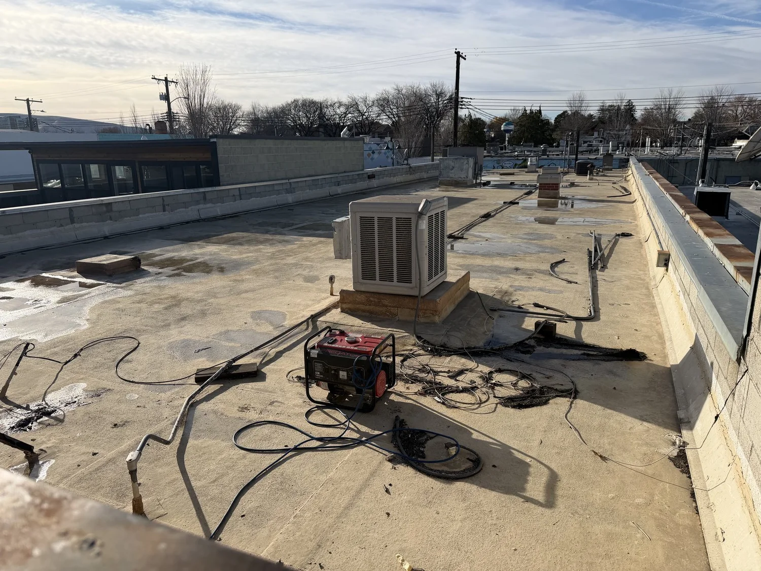 Commercial flat roof tear-off in progress in Richland, Washington